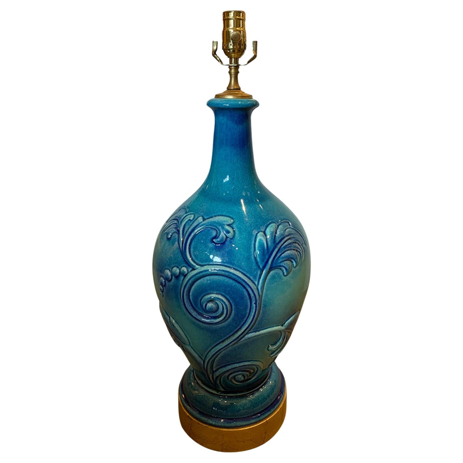 Mid-20th Century Turquoise Pottery Lamp with Floral Motif For Sale