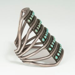 Mid-20th Century Turquoise Snake-Eye Cuff Bracelet by a Zuni Jeweler
