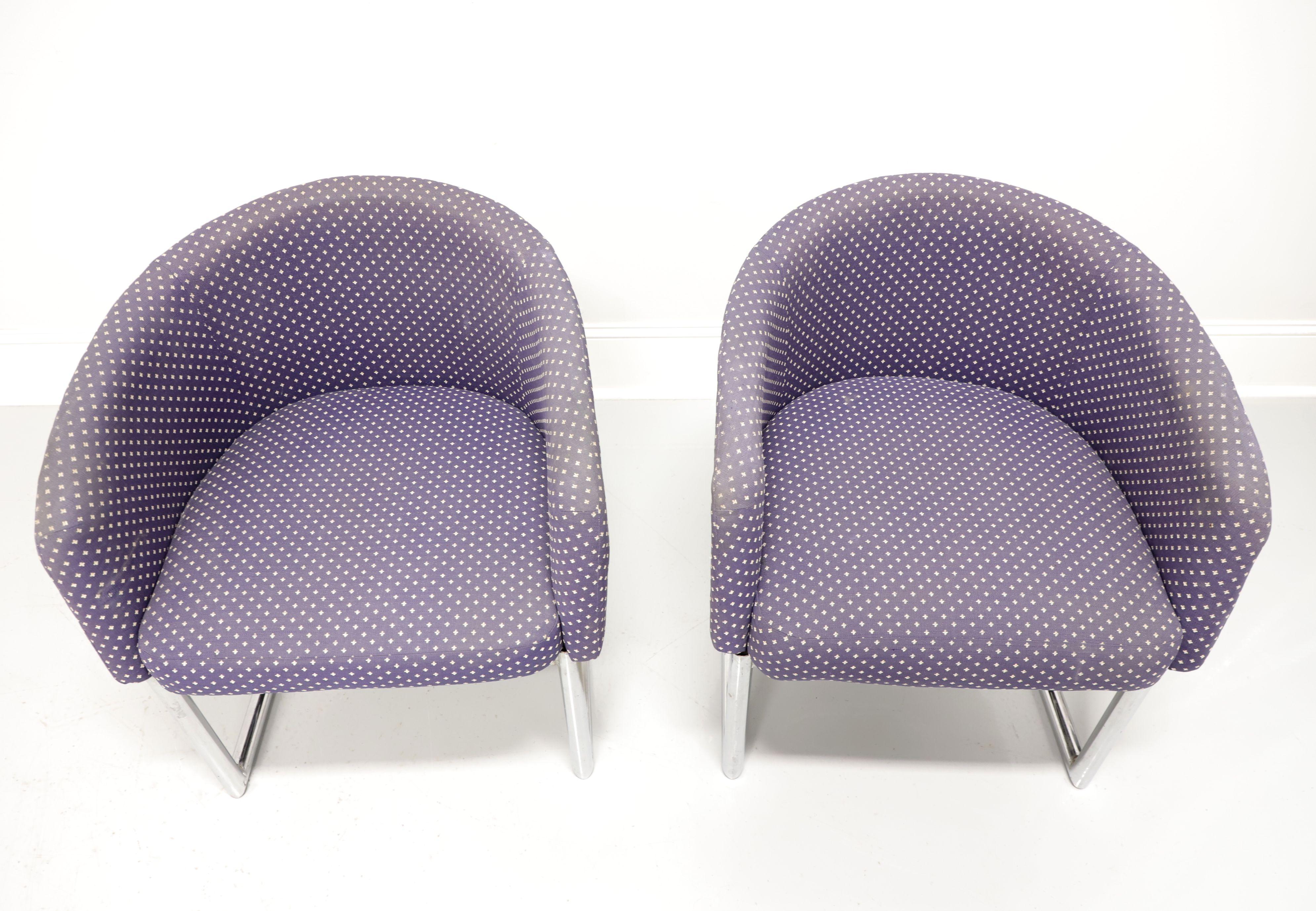 A pair of mid 20th century Contemporary style cantilever chairs, unbranded. Chrome frame, barrel back design, purplish blue & beige color fabric upholstered backs, arms and seats. Made in the USA, in the mid 20th Century.

Measures: Overall: 24.75