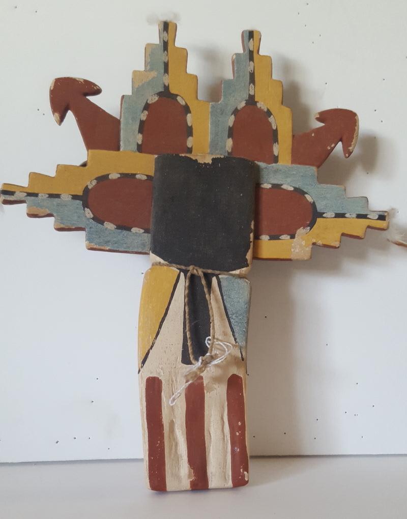 This handcrafted and painted Cottonwood is done in a traditional style. It is one of several Kachinas I have collected since 1982 by this
Kachina artist. All of these were purchased from a previous collector of this unknown maker. The paint type,