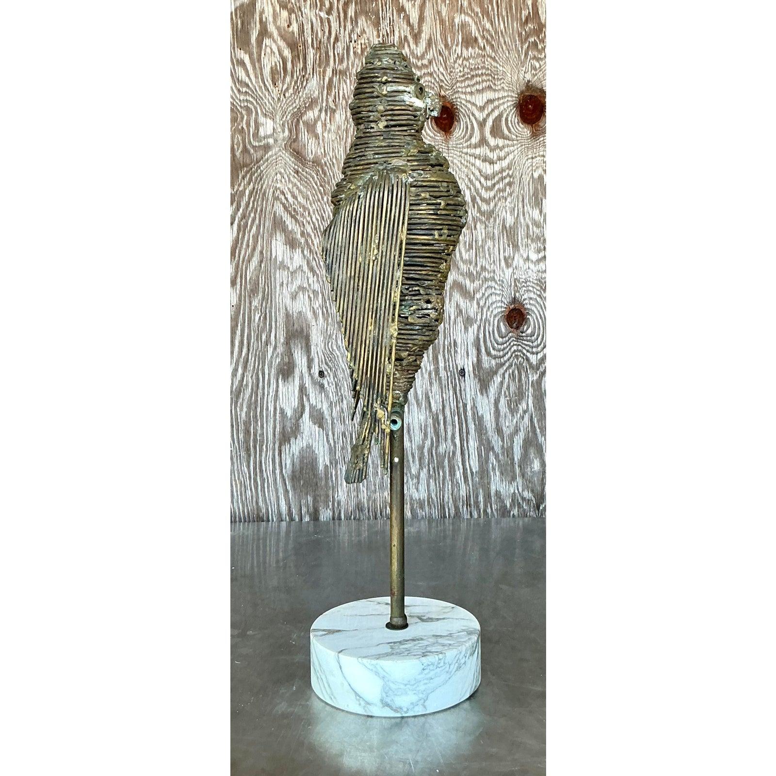 Scopri l'accattivante arte di H. W. Hauptman con questa splendida scultura in ottone vintage 