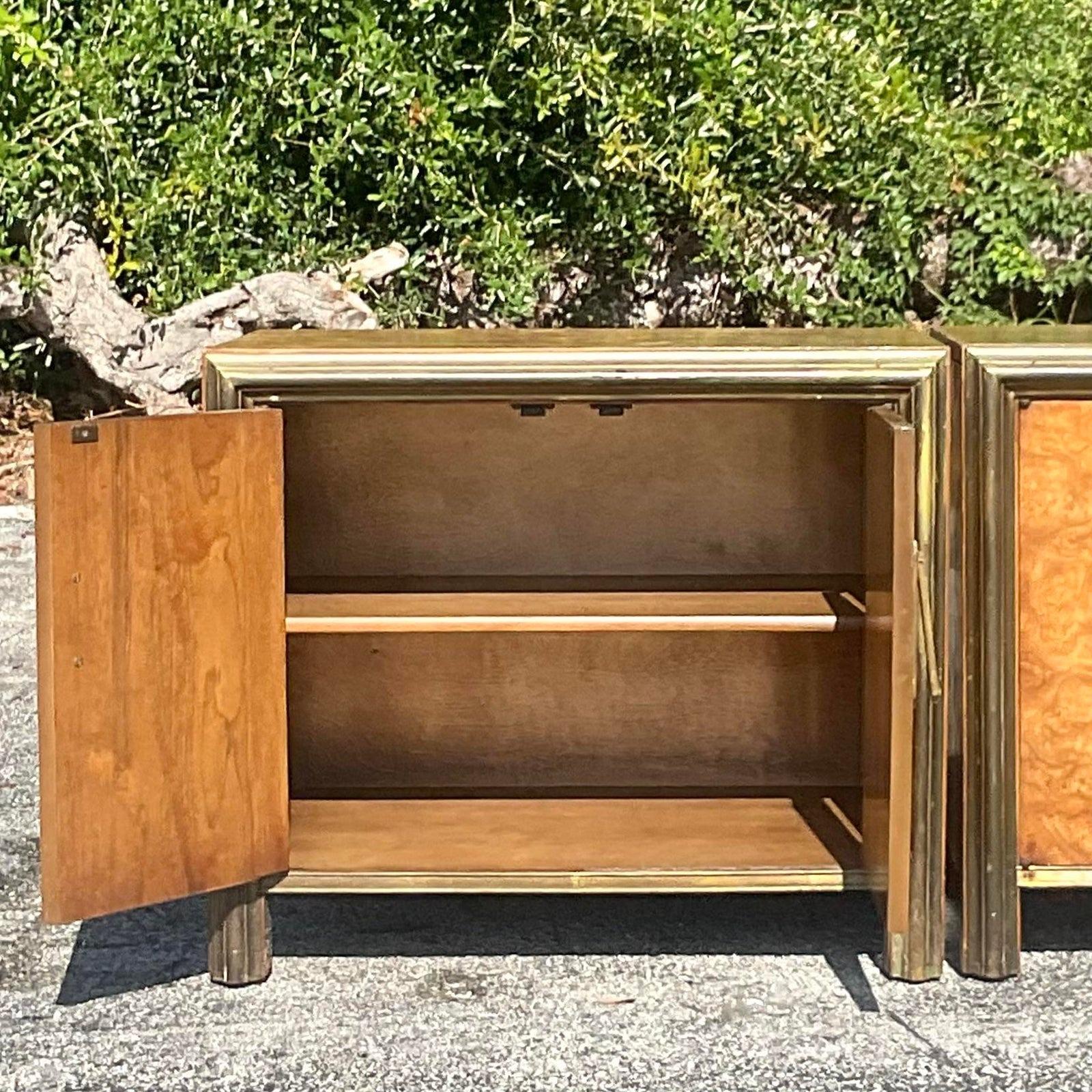 A fabulous pair of vintage Boho nightstands. Made by the iconic Mastercraft group. Beautiful Burl wood cabinet with heavy brass trim. Matching dresser also available. Acquired from a Palm Beach estate.