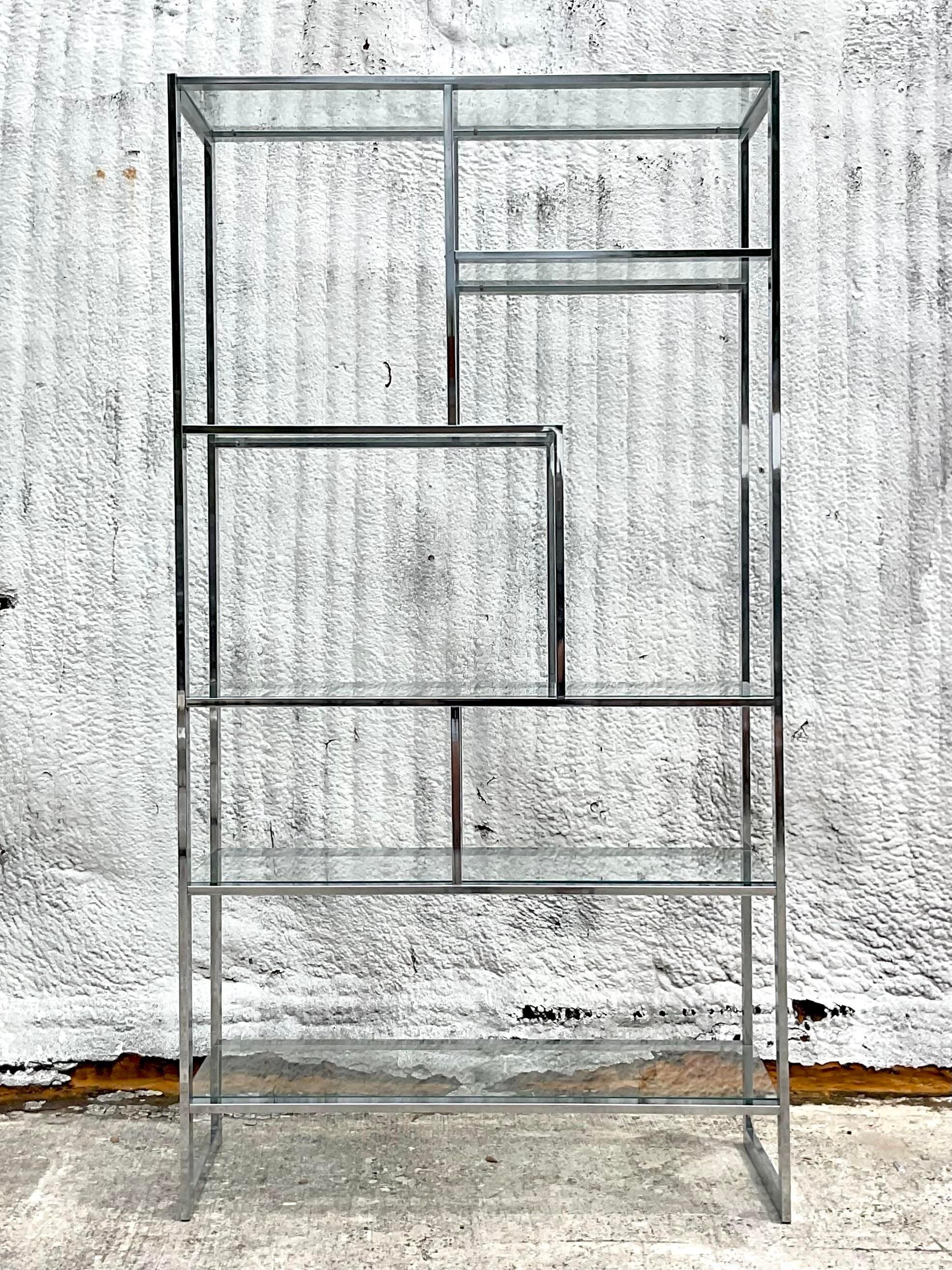 Boho Chic with American Flair: Vintage Polished Chrome Etagere Inspired by DIA. Elevate your space with this iconic piece, blending bohemian sophistication with American craftsmanship for a stylish and functional storage solution.