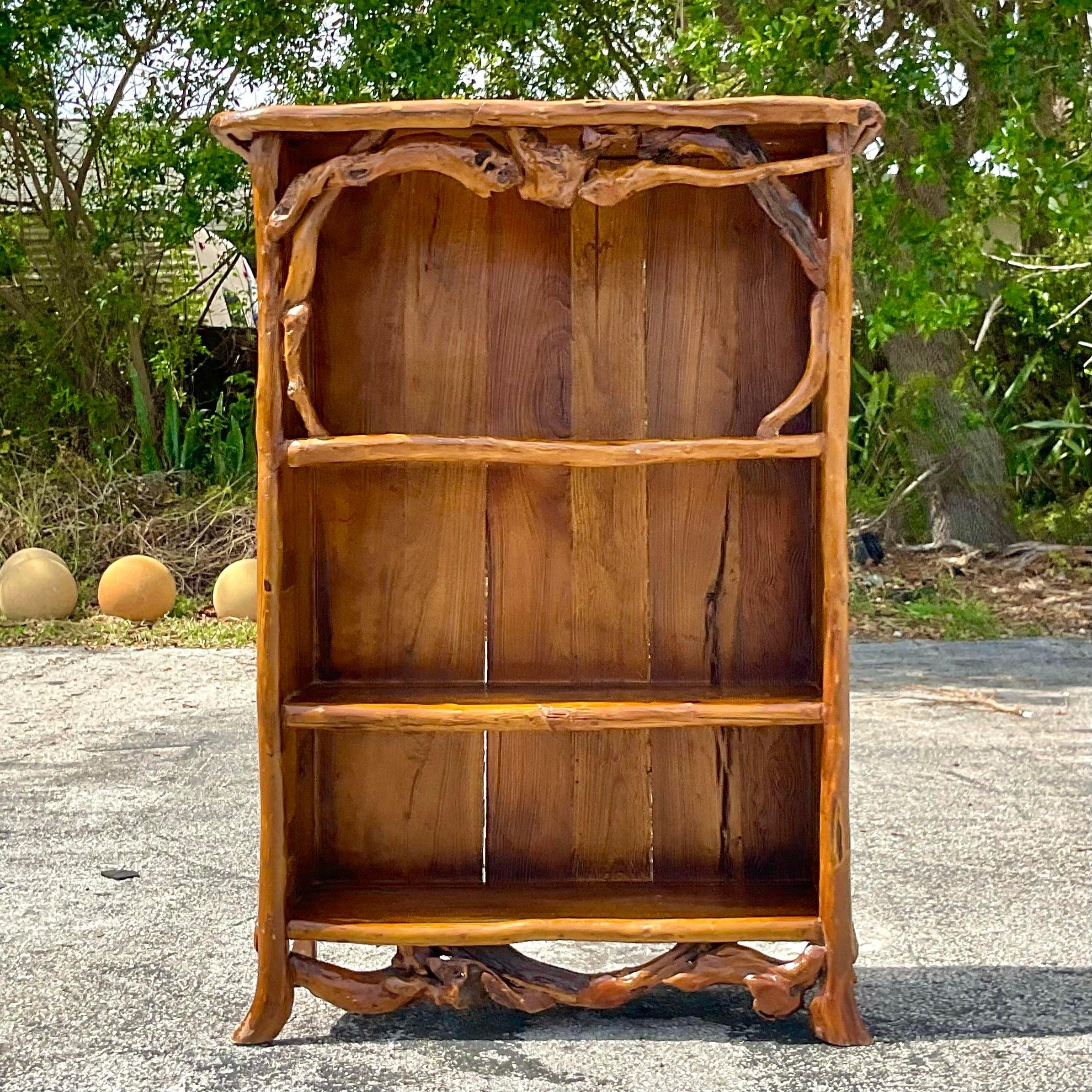 Rustic Revival: Elevate your décor with this Vintage Boho Primitive Branch Etagere. Crafted with natural charm and American character, it's the perfect blend of functionality and whimsical style for any space.