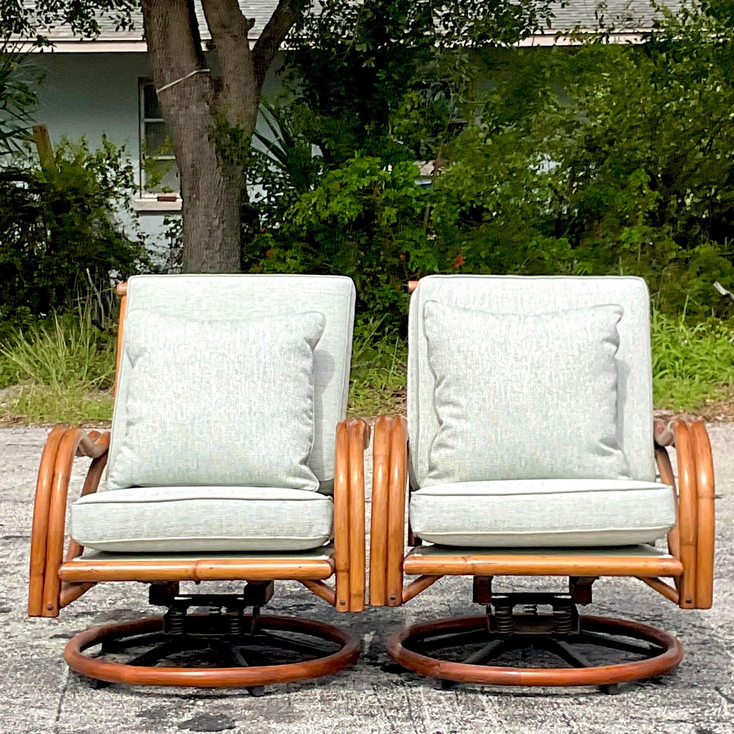 Fabric Mid-20th Century Vintage Coastal Bent Rattan Swivel Chairs - a Pair For Sale