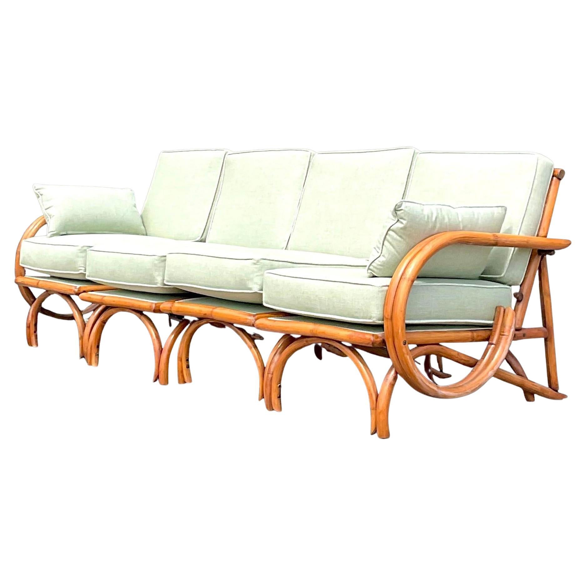 Mid 20th Century Vintage Coastal Bent Rattan Four Seat Sofa For Sale