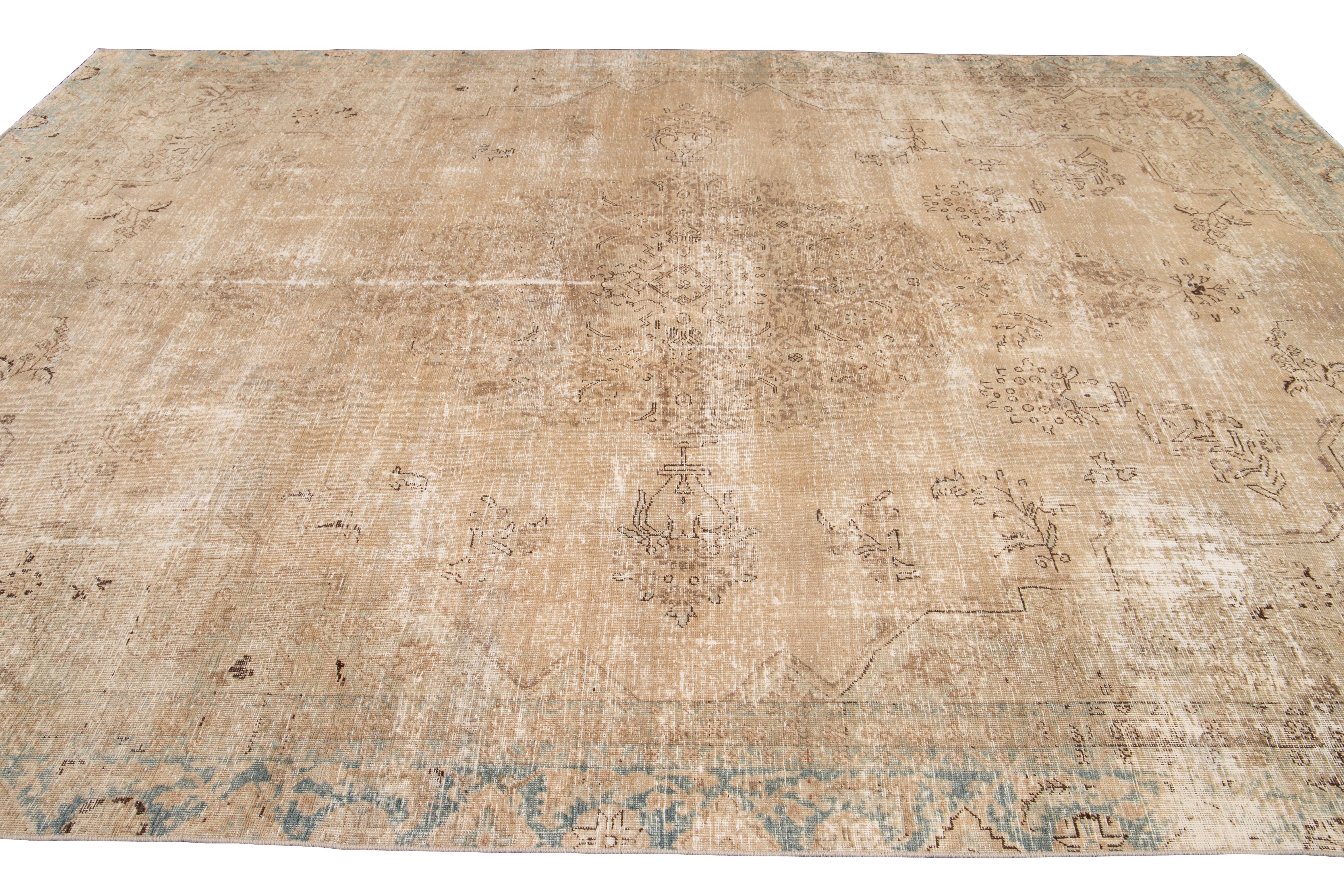 Mid-20th Century Vintage Distressed Tabriz Wool Rug For Sale 2