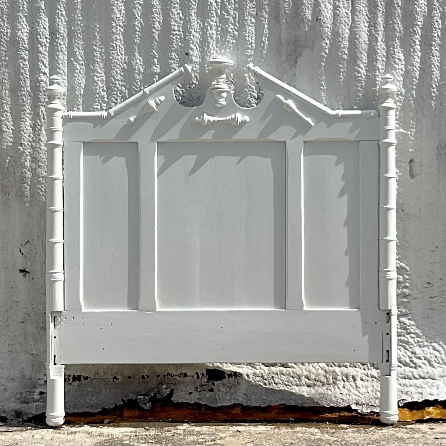 A fabulous vintage Regency full headboard. A chic Georgian style headboard with a painted white finish. Lots of great class detail. Acquired from a Palm Beach estate.