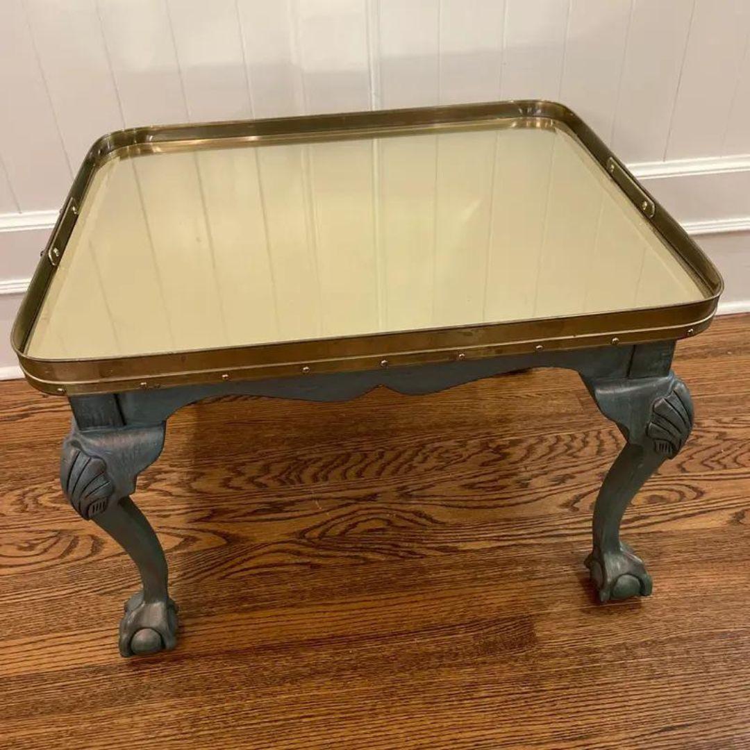 Regency Style Brass Mirrored, Greenwood Cocktail, Side Table, or even small coffee table. Brass top with double handles, wood base with pierced scalloped skirt, cabriole legs, claw, and ball feet. 

Sourced from the estate of a Kentucky Doctor with
