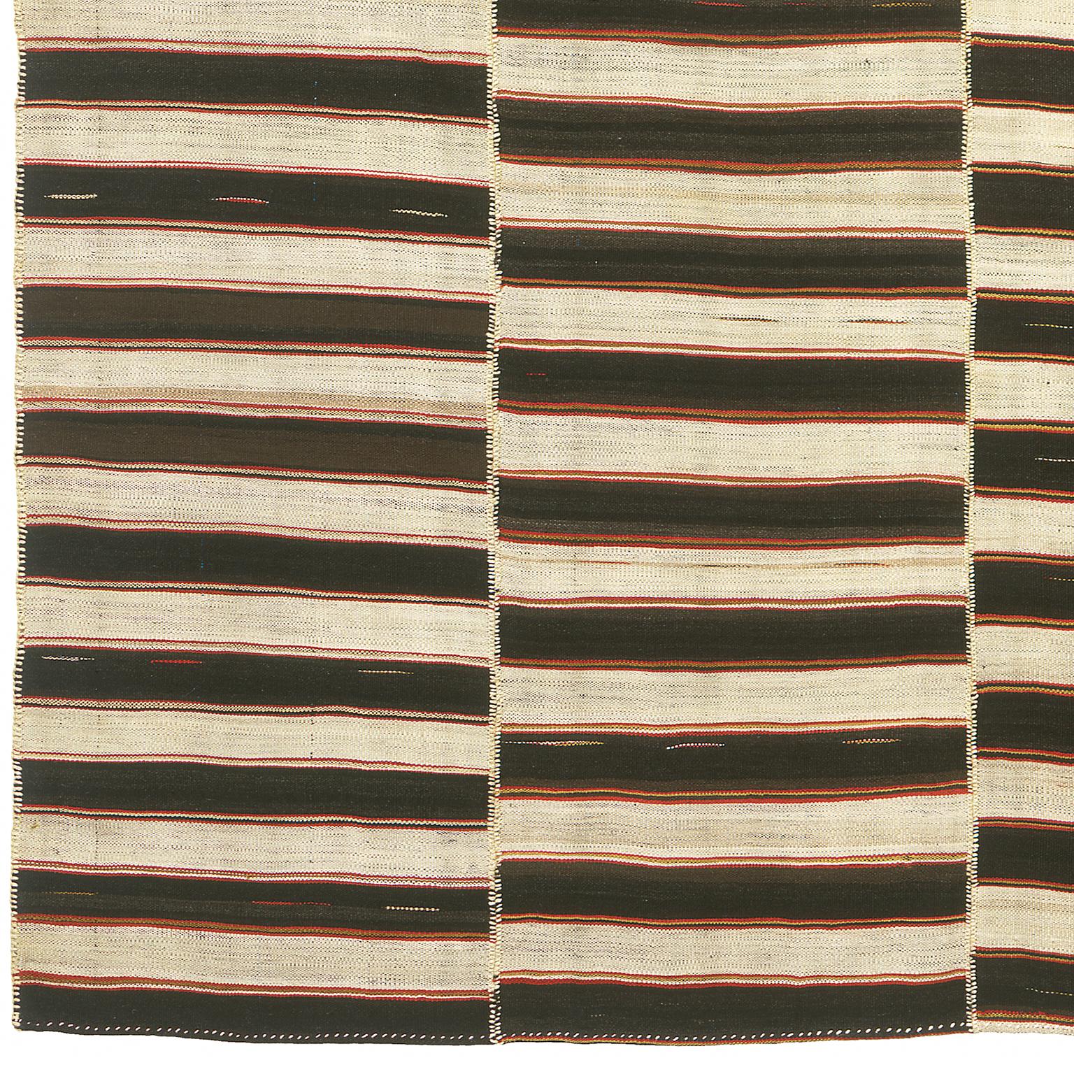 Mid-20th century Vintage Kilim composition carpet
Persian panels, circa 1940
Handwoven.
  