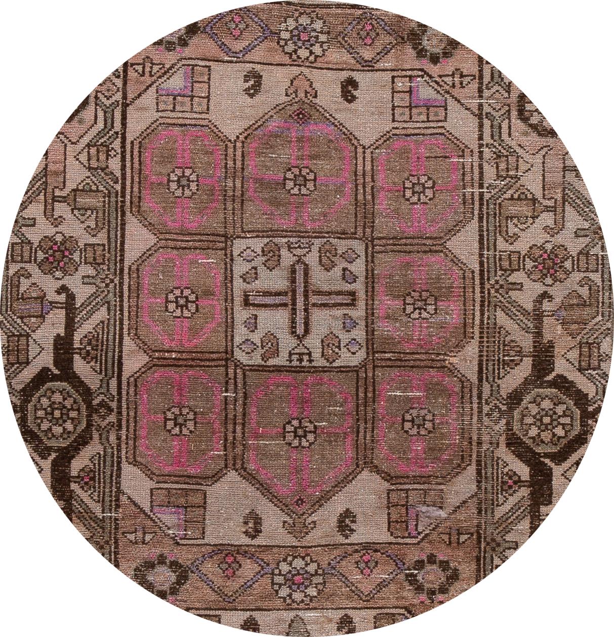 Beautiful vintage Malayer Persian runner rug with a brown field, pink and ivory accents with an all over medallion design. 

This rug measures 3'2