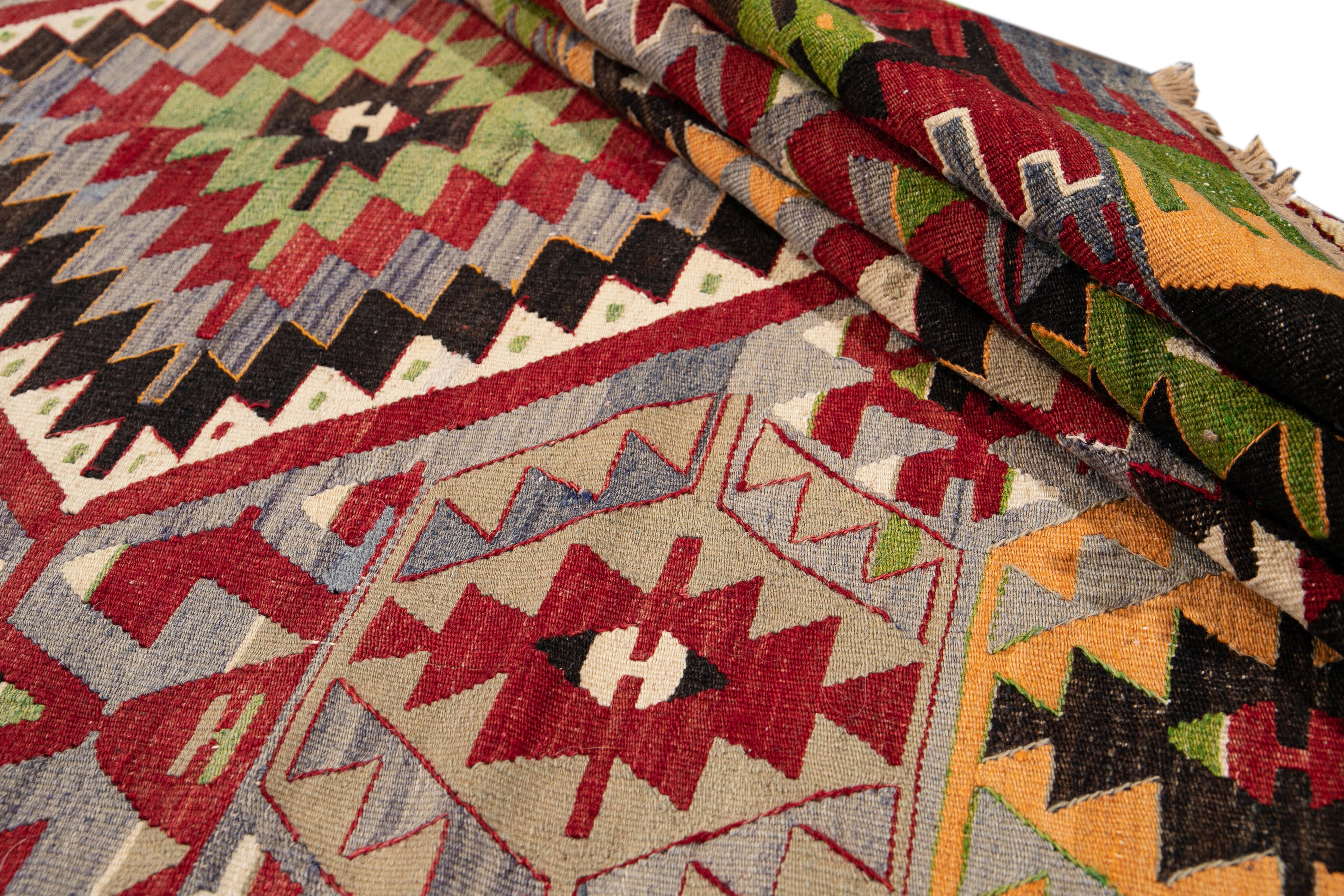 Mid-20th Century Vintage Multicolored Geometric Turkish Kilim Wool Rug In Excellent Condition In Norwalk, CT
