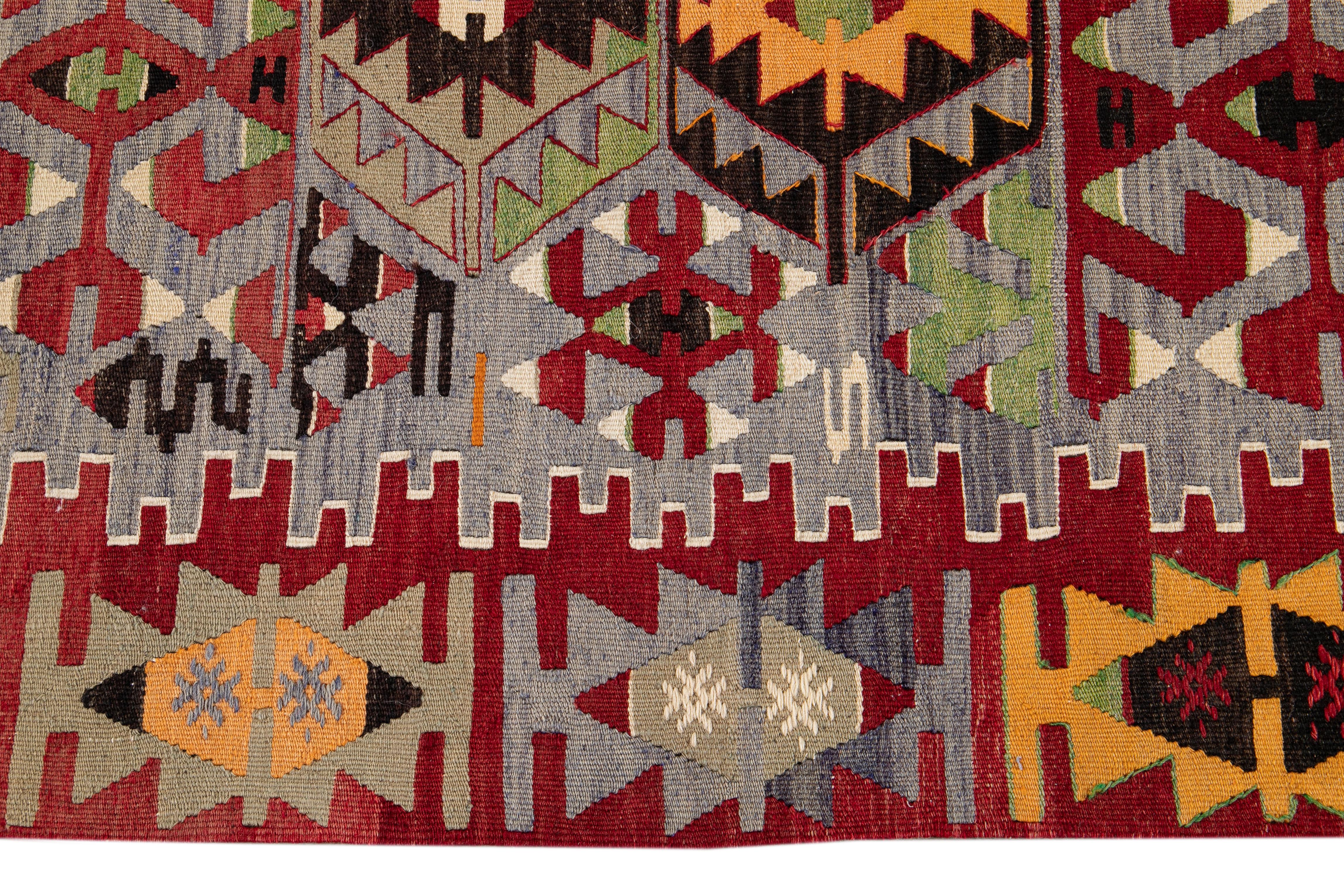 Mid-20th Century Vintage Multicolored Geometric Turkish Kilim Wool Rug 2