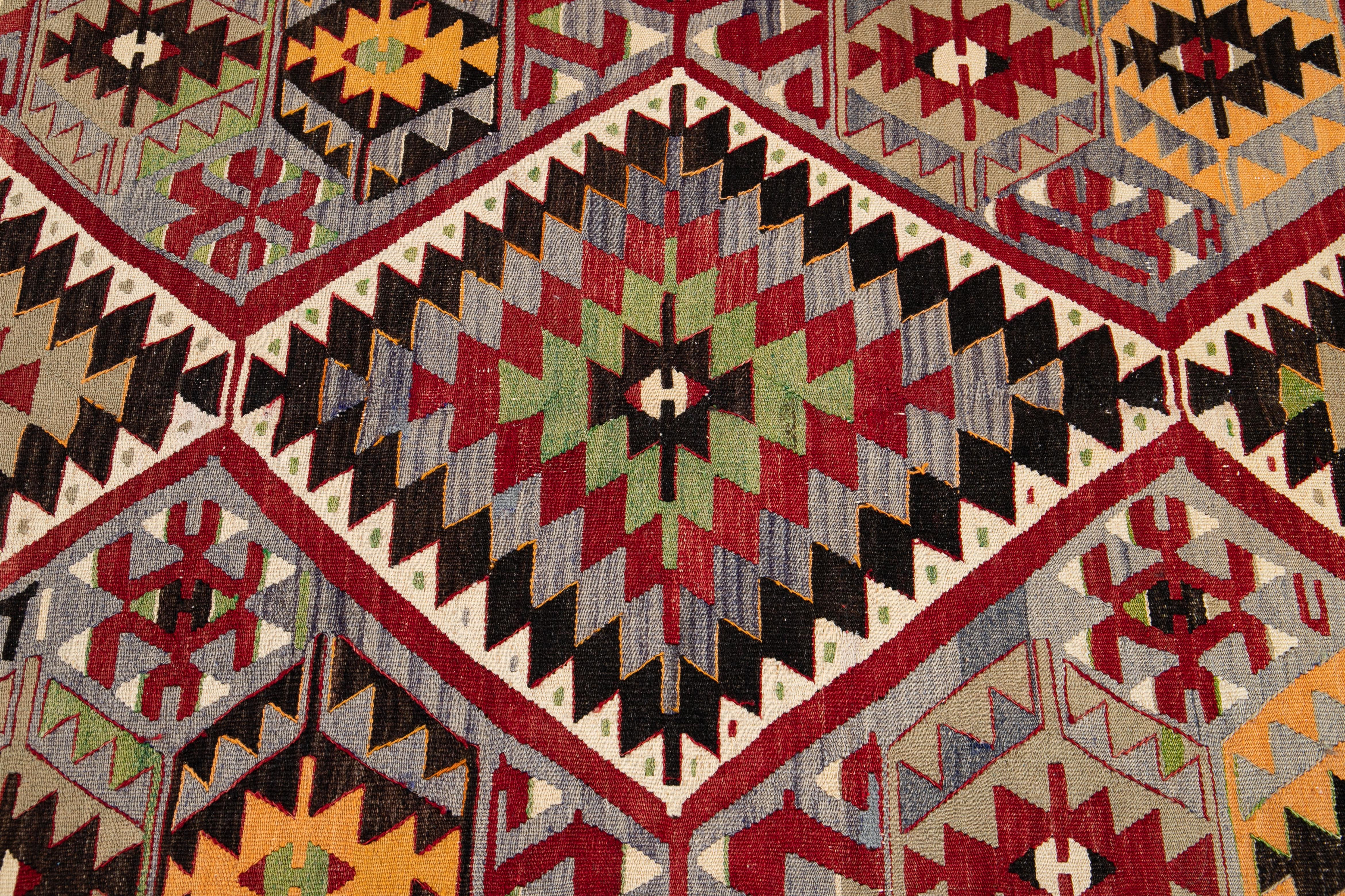 Mid-20th Century Vintage Multicolored Geometric Turkish Kilim Wool Rug 4