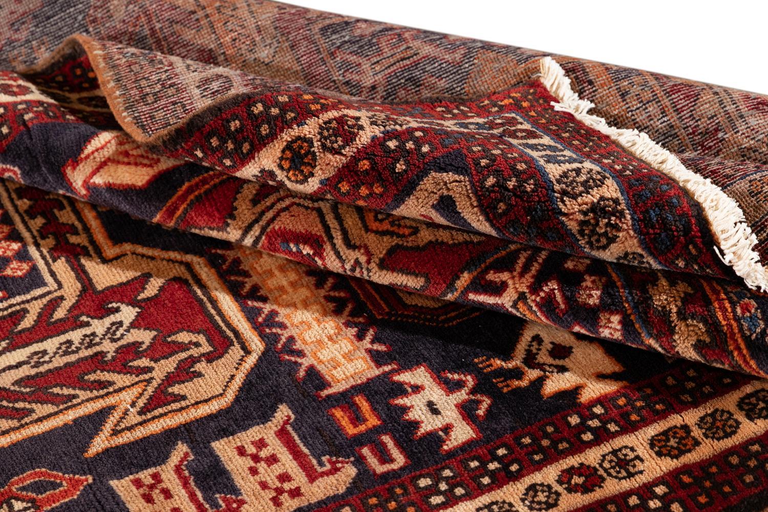 Vintage hand knotted North West Persian rug with a Traditional design. This piece has great detailing and would be the perfect addition to your home. Made with 100% wool.