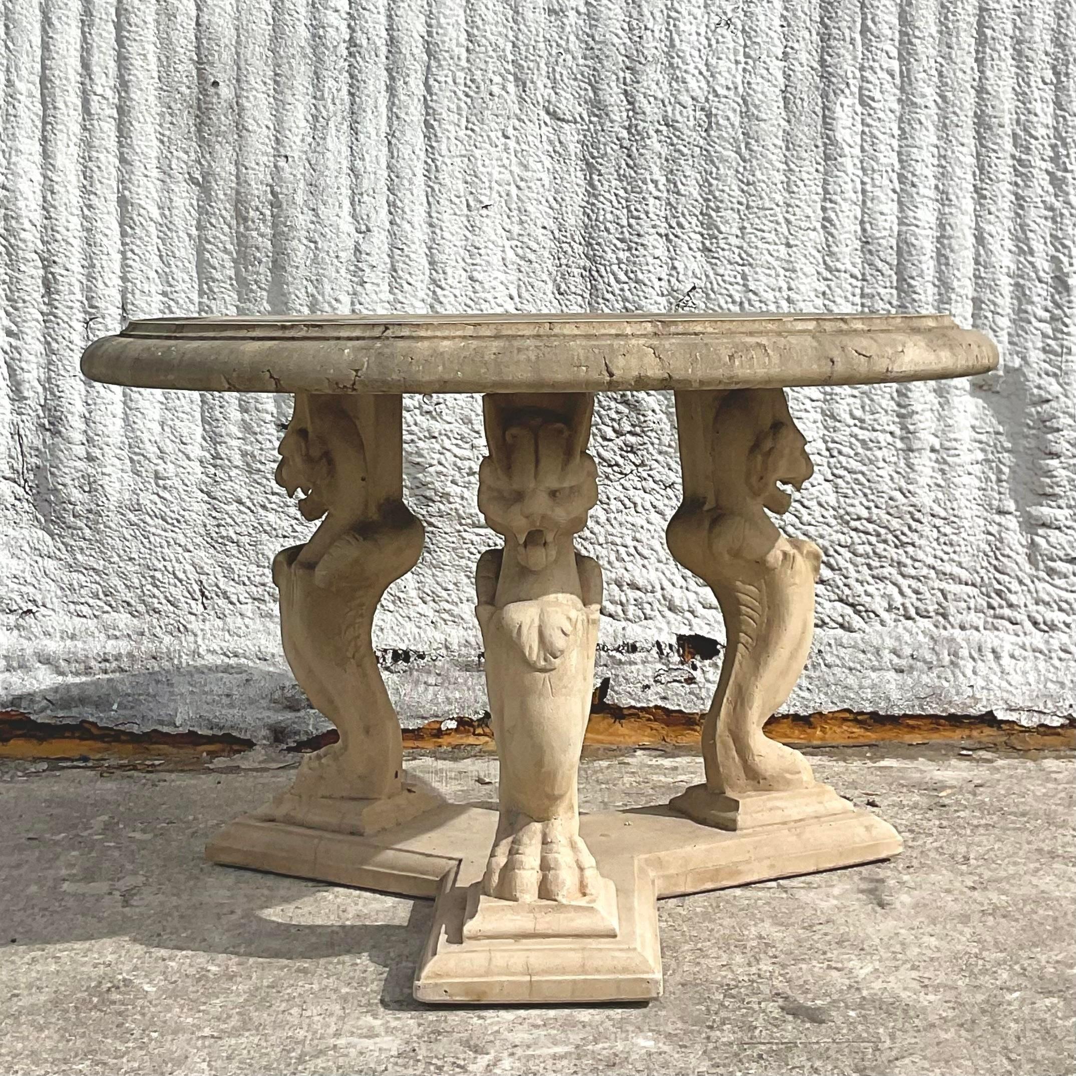 A stunning vintage Regency center hall table. A chic phoenix design in a cast concrete. A beautiful all over patina from time. Easily cleaned if you want a clean start. Perfect indoors or outside. You decide! Acquired from a Palm Beach estate.