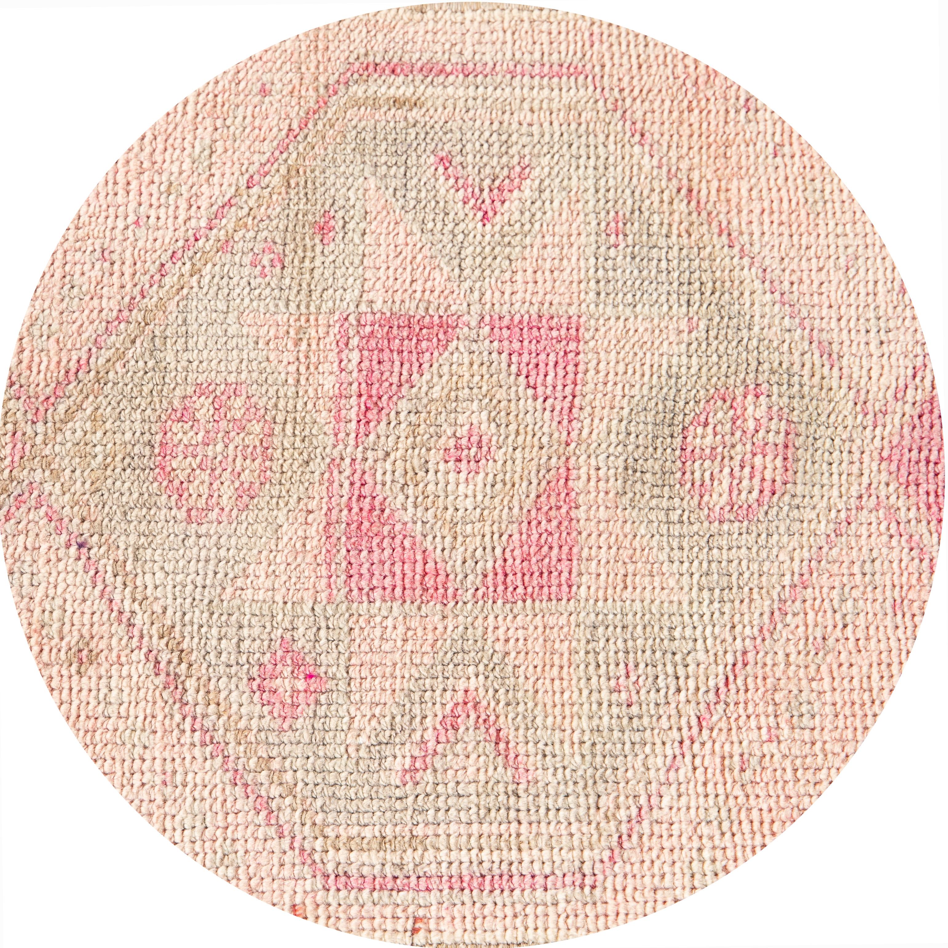 Beautiful vintage runner rug, hand-knotted wool with a blush field, ivory and pink accents in multi medallion design, circa 1930.
This rug measures 1' 8