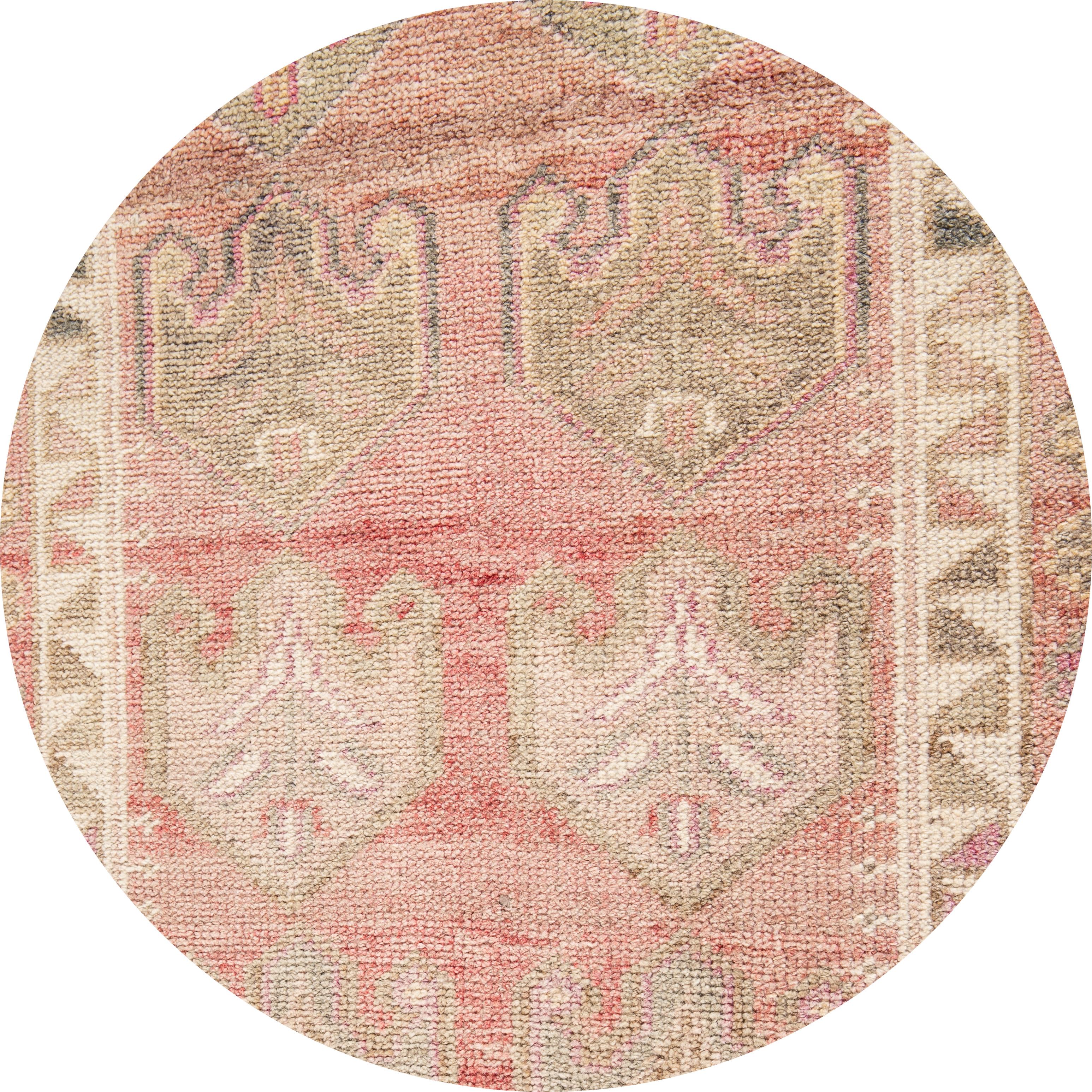 Beautiful vintage runner rug, hand knotted wool with a blush field, pink and gray accents in multi medallion design.
This rug measures 2' 10