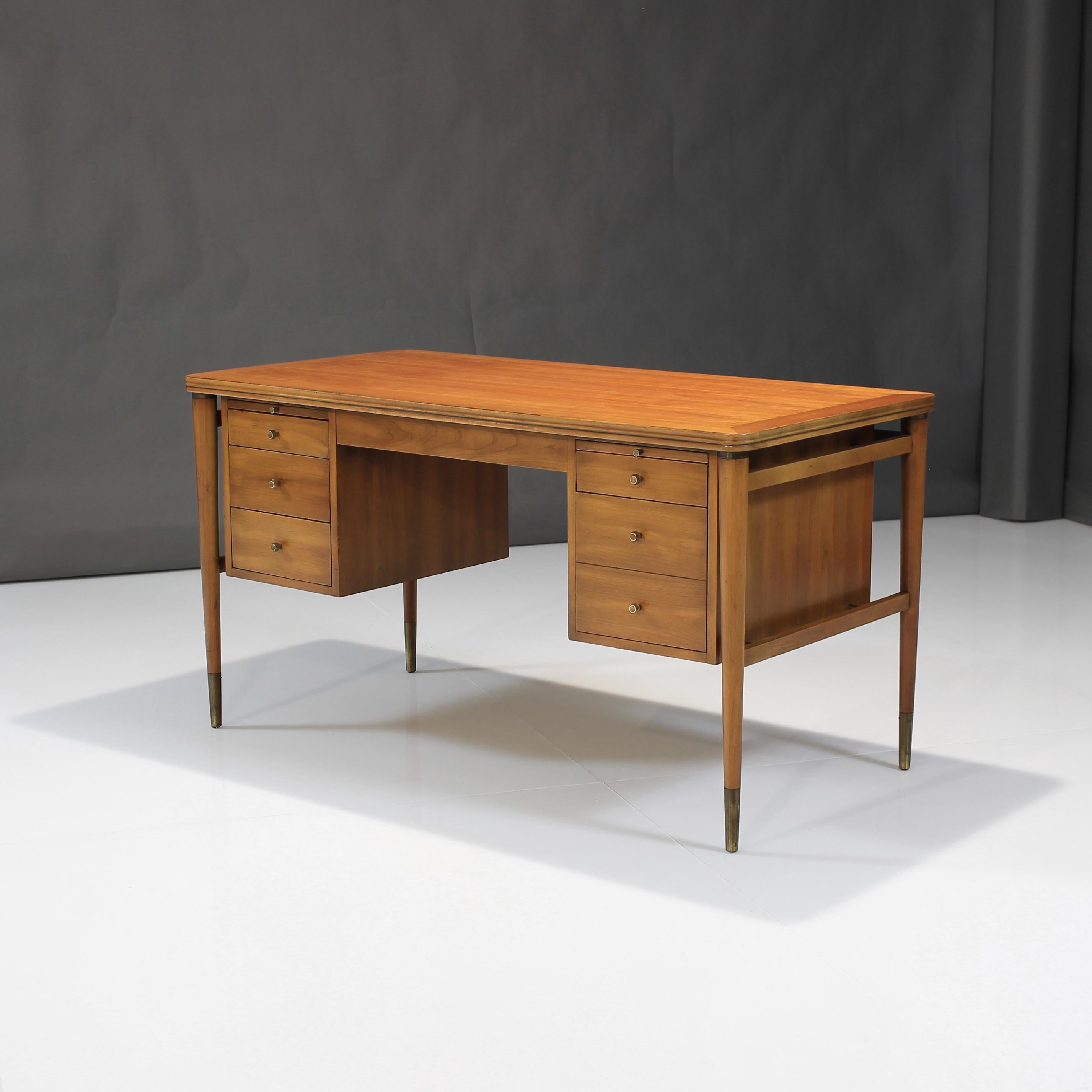 Presenting this exceptional desk by John Widdicomb.

We've had many desks come through our collection and this Desk by Widdicomb shows off some of the finest craftsmanship offered at the time of the Mid-20th Century.

Elevated in a stately