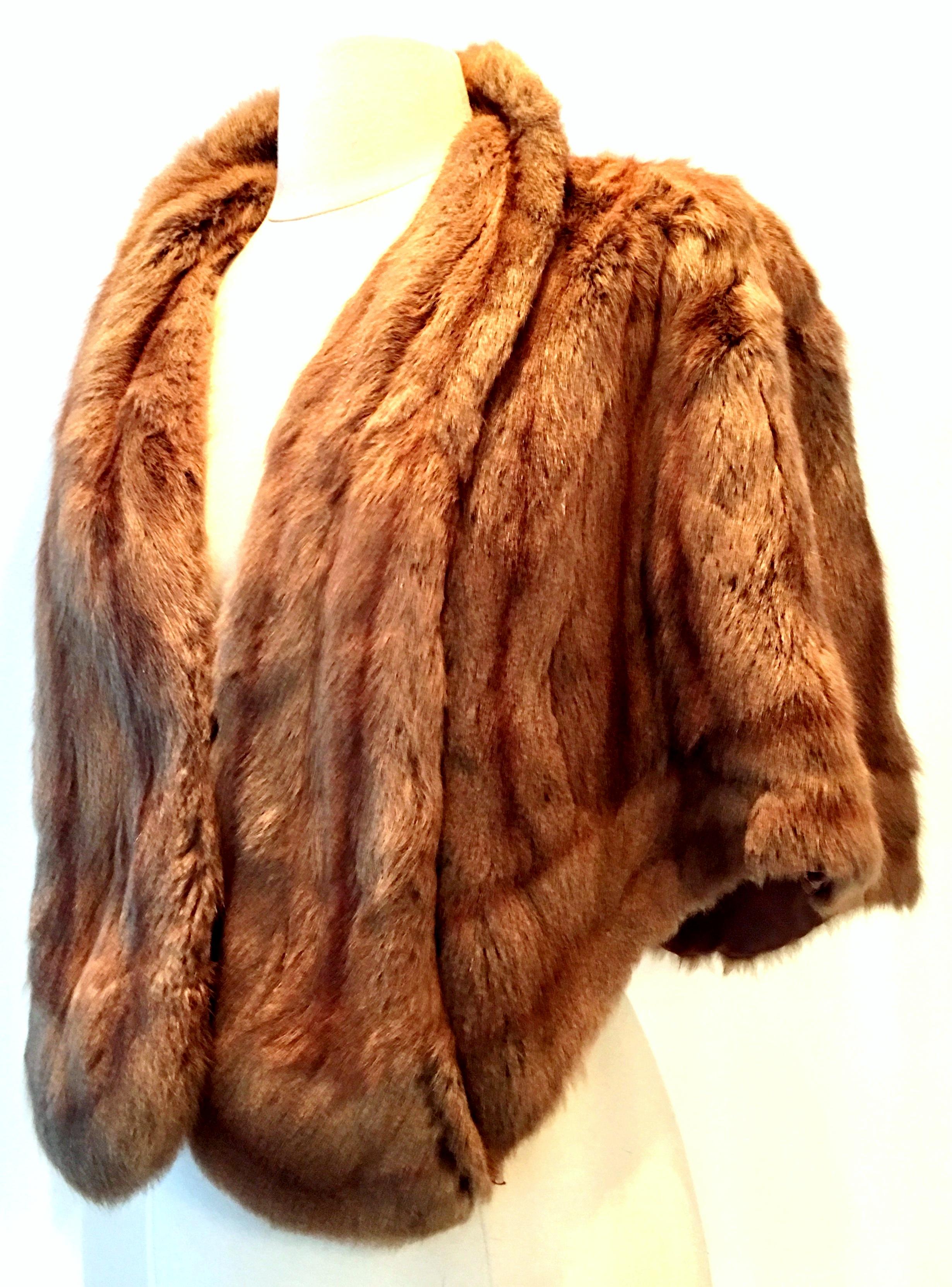 Mid-20th Century Whiskey Dyed Rabbit Fur Capelet-Stole by Polsky's -Akron Ohio This finely made and well preserved stole or capelet has a roll over collar with two side pockets and is fully lined. Maintains the original 