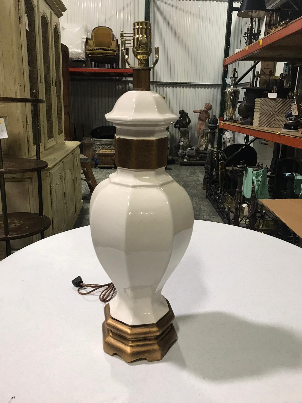 Mid-20th century white ceramic lamp with custom gilded base
New wiring.