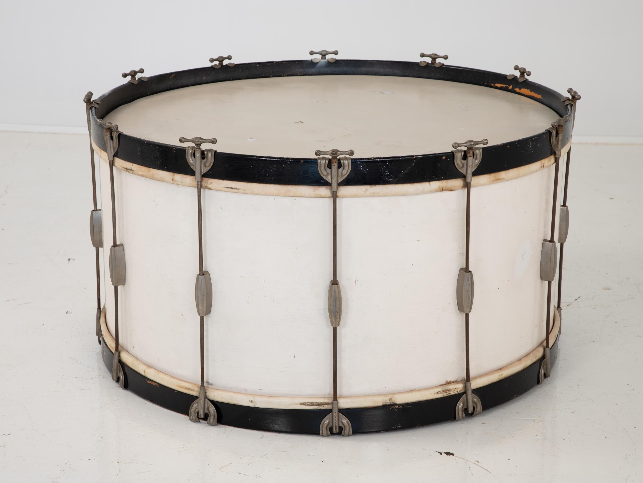A mid 20th-century large drum to be used as a cocktail table. Wear consistent with age and use.