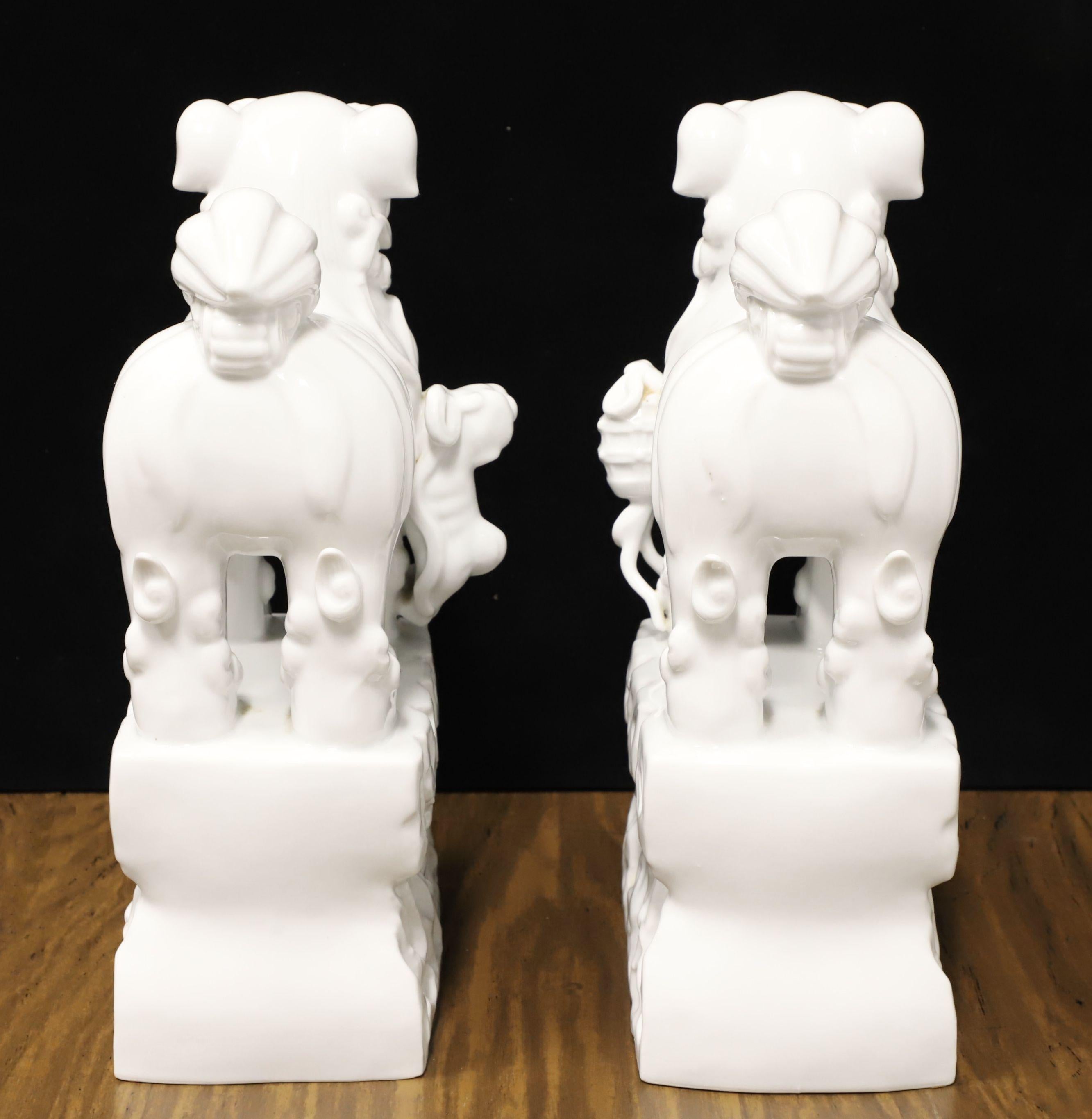 Unknown Mid 20th Century White Porcelain Foo Dogs - Pair For Sale