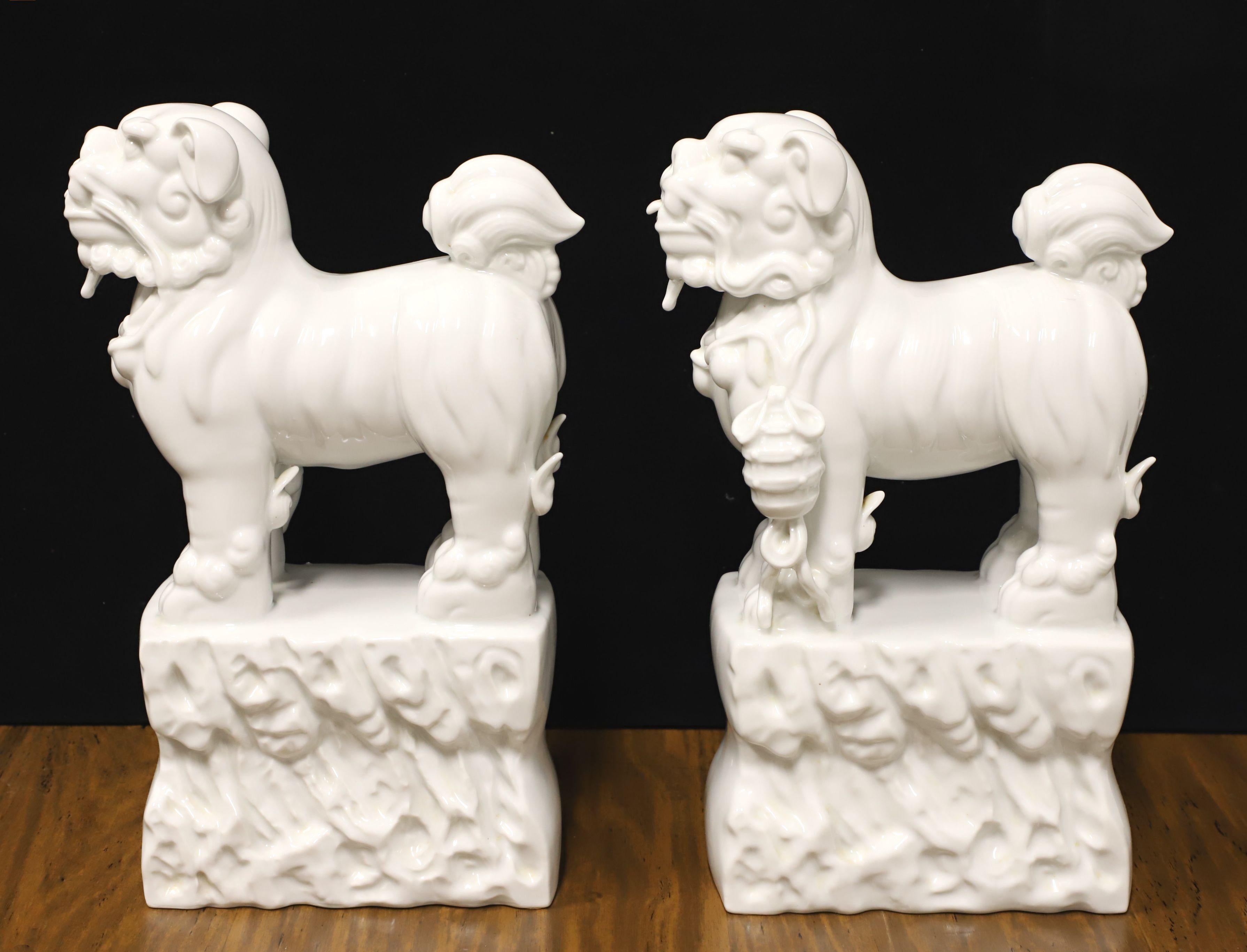 Mid 20th Century White Porcelain Foo Dogs - Pair In Good Condition For Sale In Charlotte, NC