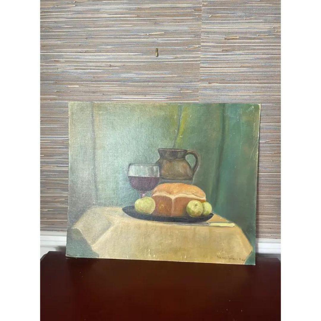 Large scale still life original oil painting with wine, fruit, a jug, and bread. The work is signed by the artist, Nancy Wilson Gaw, a Middle Tennessee artist and art teacher known for her oil paintings, in the bottom corner.