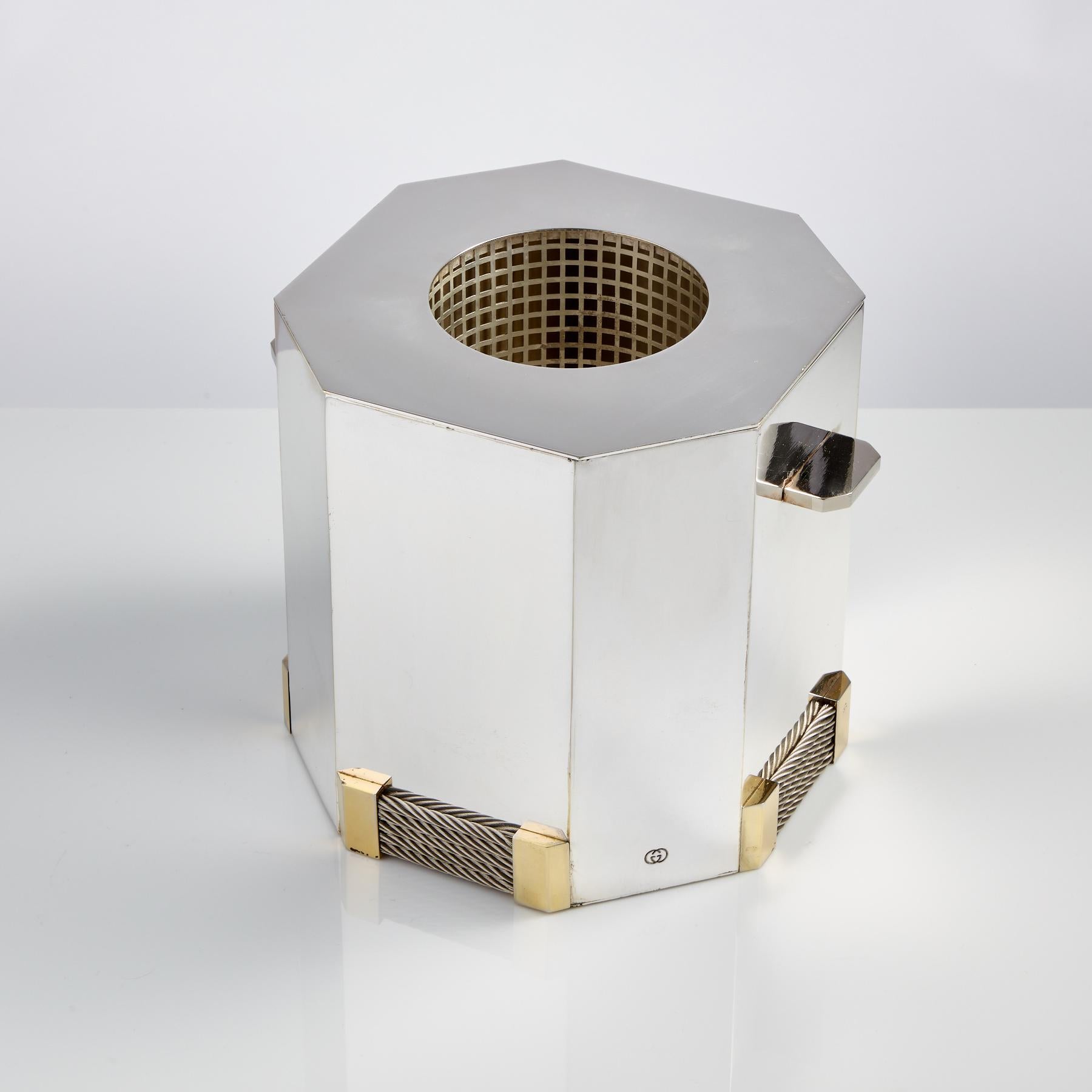 Mid-20th century wine and champagne cooler by Gucci.
This design is very much in the Gucci tradition, made in silver plate with applied rope & gilded mounts decoration, the interior collar & cage lift out for cleaning, all as shown.
     