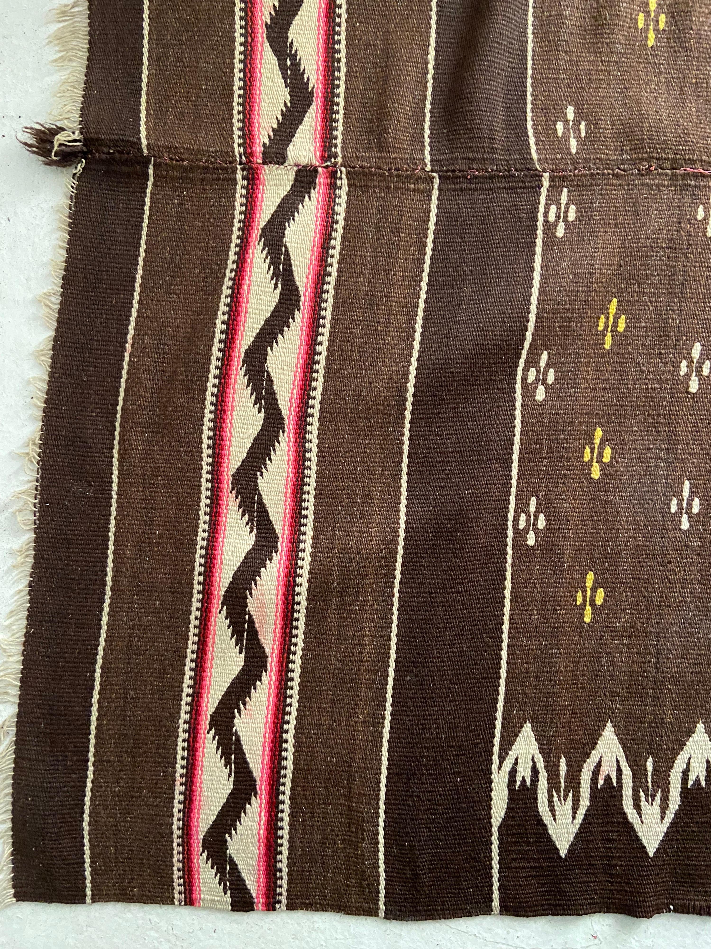 Mid-20th century wool blanket from the Tlacolula area of Oaxaca. Woven on a back-strap loom with 2 sections woven together. Colors remain intact with little to no fading. Center medallion area reminiscent of the serape/saltillo style of design.