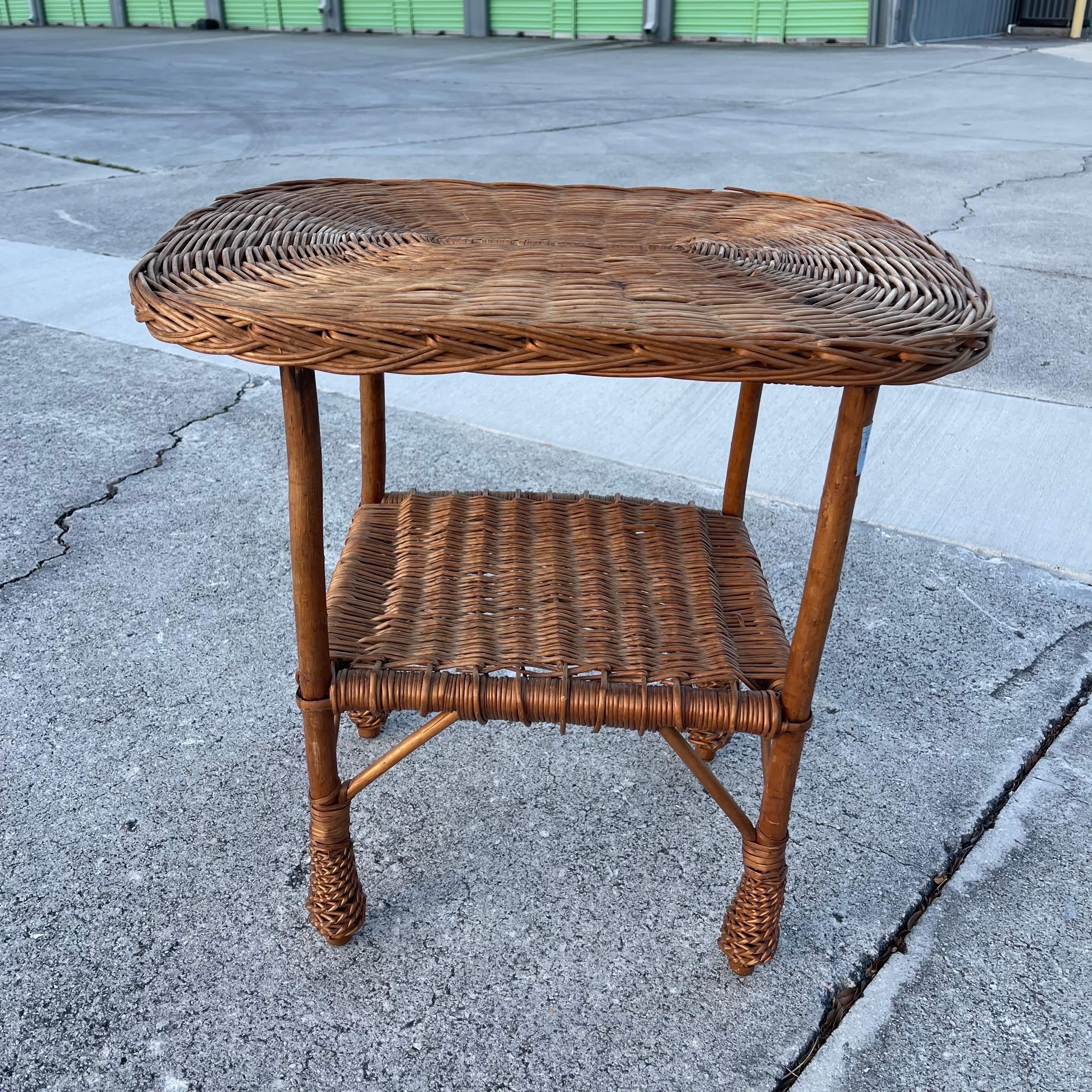 Charming side table handmade of woven wicker.