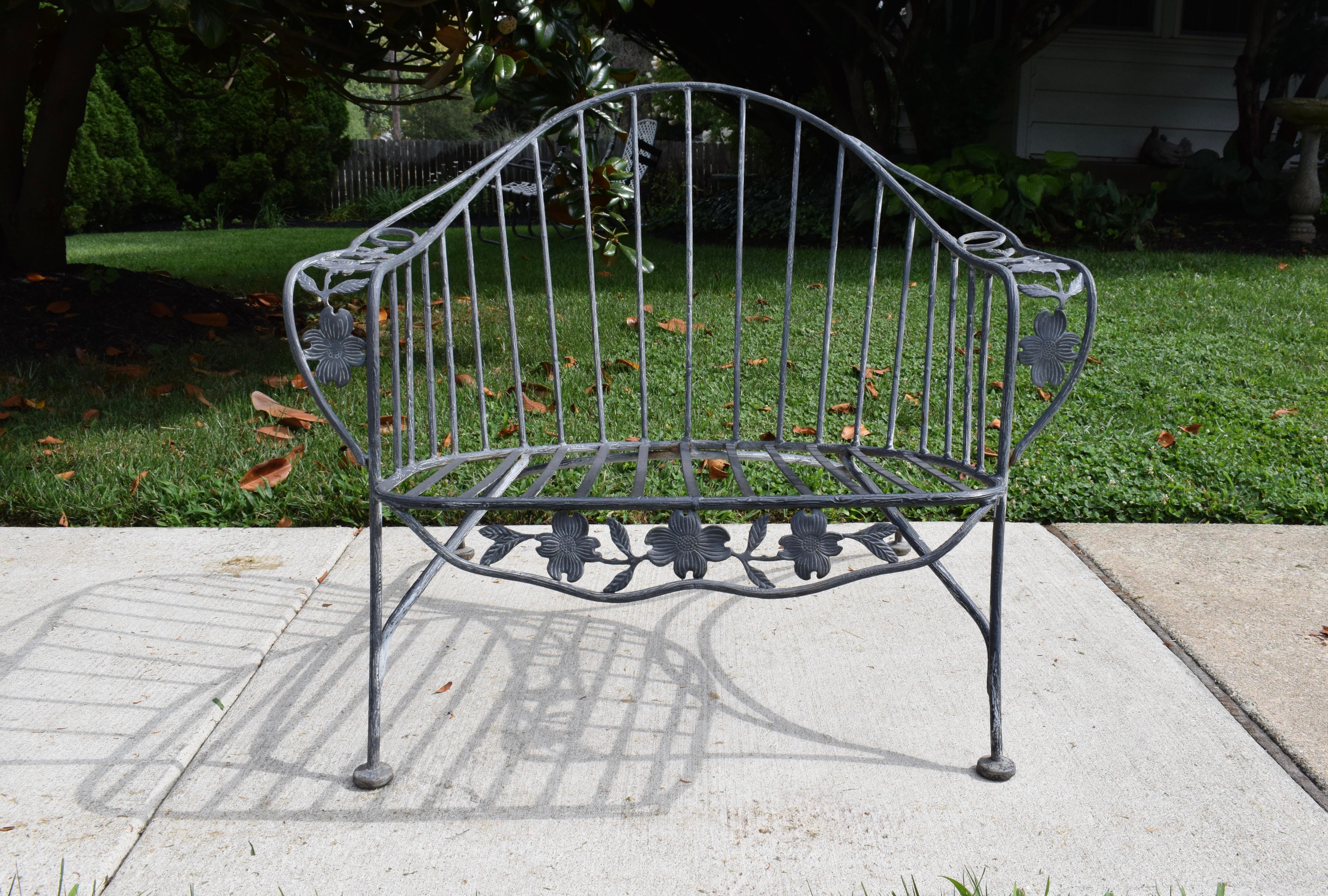 An unusual wrought Iron Faux Bois Patio or Garden chair in the form of true Dogwood. Very heavy solid construction with gorgeous Gazelle styling to the legs, circa 1960's; USA. Unknown maker, quite substantial in the manner of Russel Woodard in