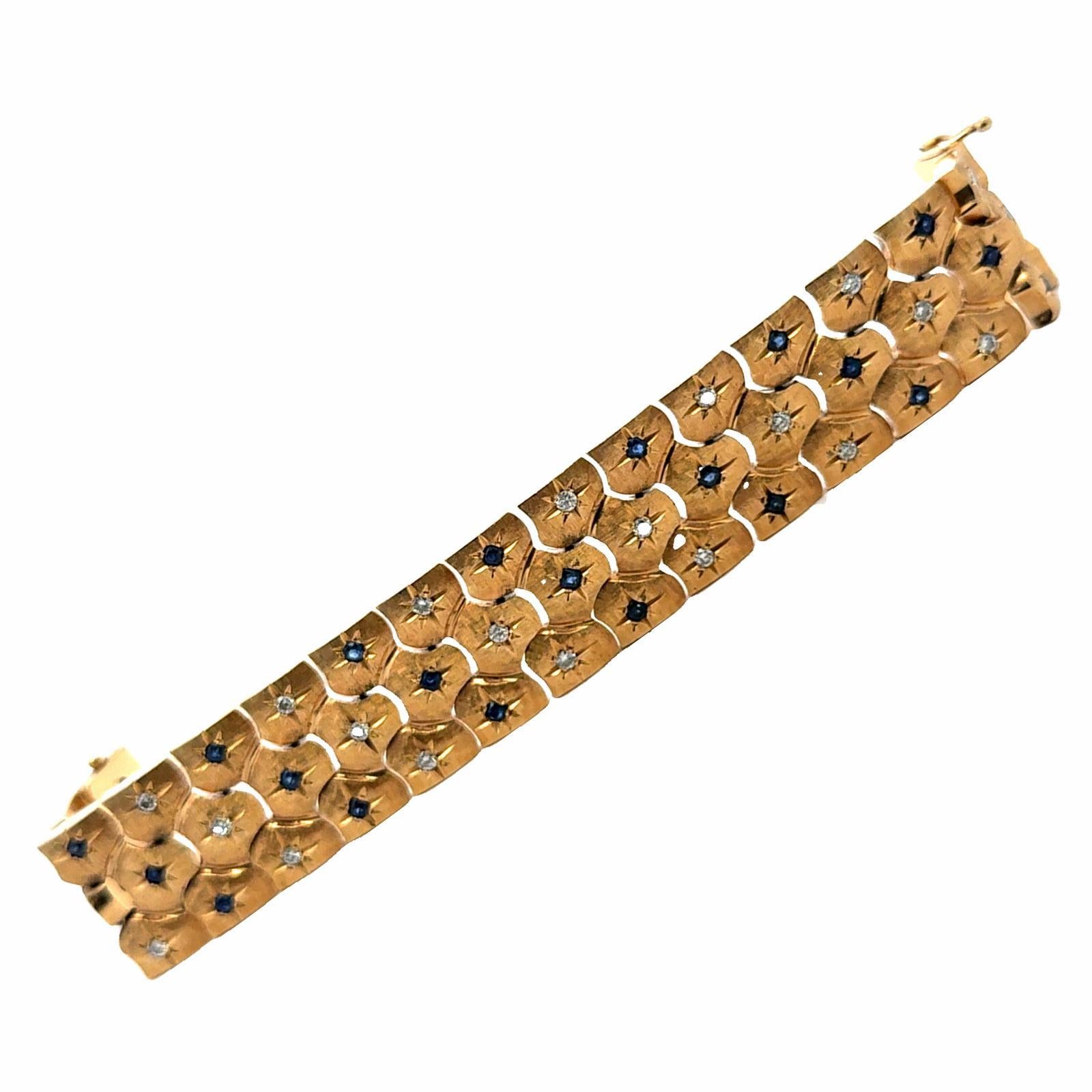 Breites Vintage-Gliederarmband aus 14 Karat Gelbgold mit Diamanten und Saphiren aus der Mitte des 20. Jahrhunderts (Retro) im Angebot