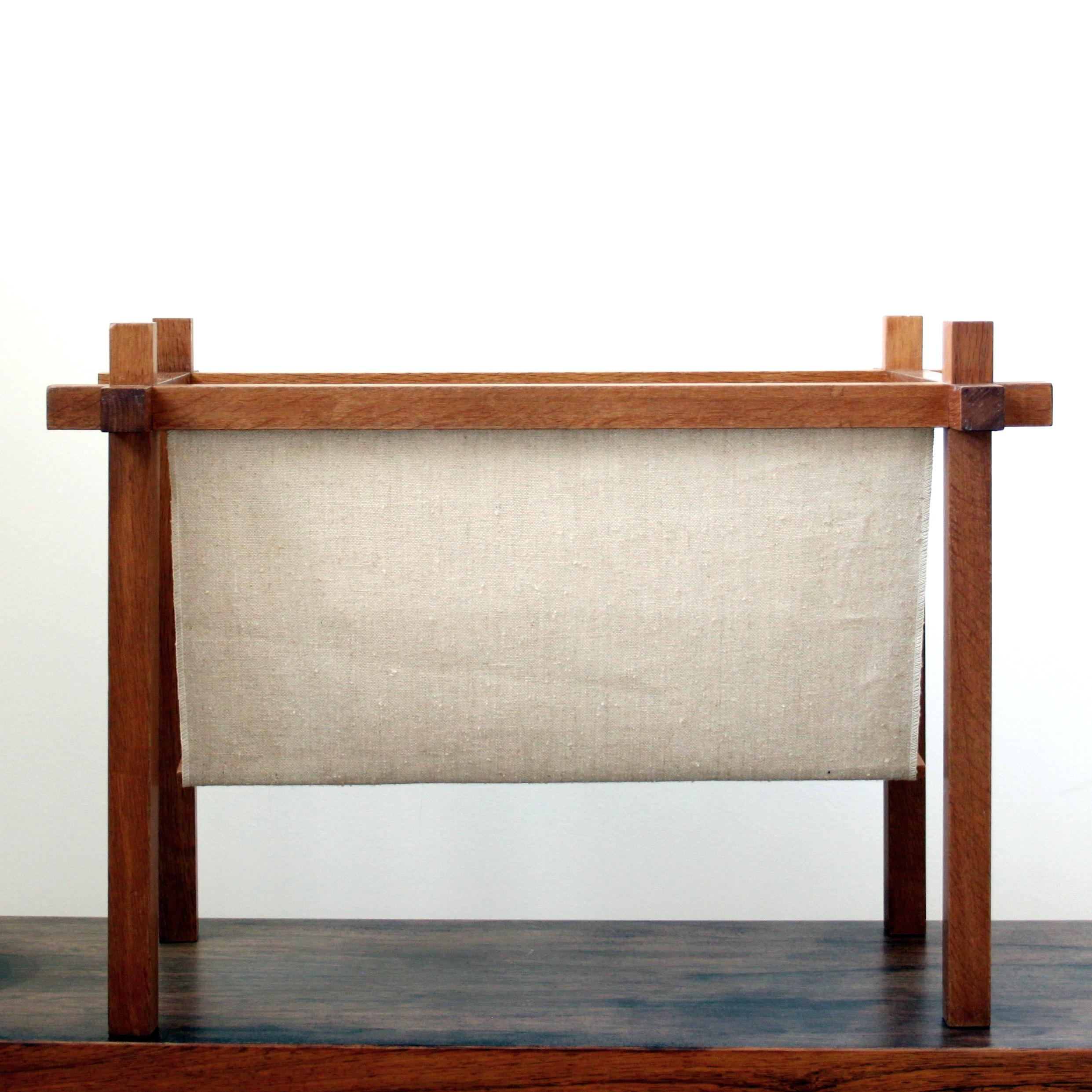 https://a.1stdibscdn.com/mid-20th-magazine-holder-in-teak-and-canvas-by-skde-skjern-denmark-1960s-for-sale-picture-2/f_15412/f_284812021651835787693/IMG_3946_master.jpg