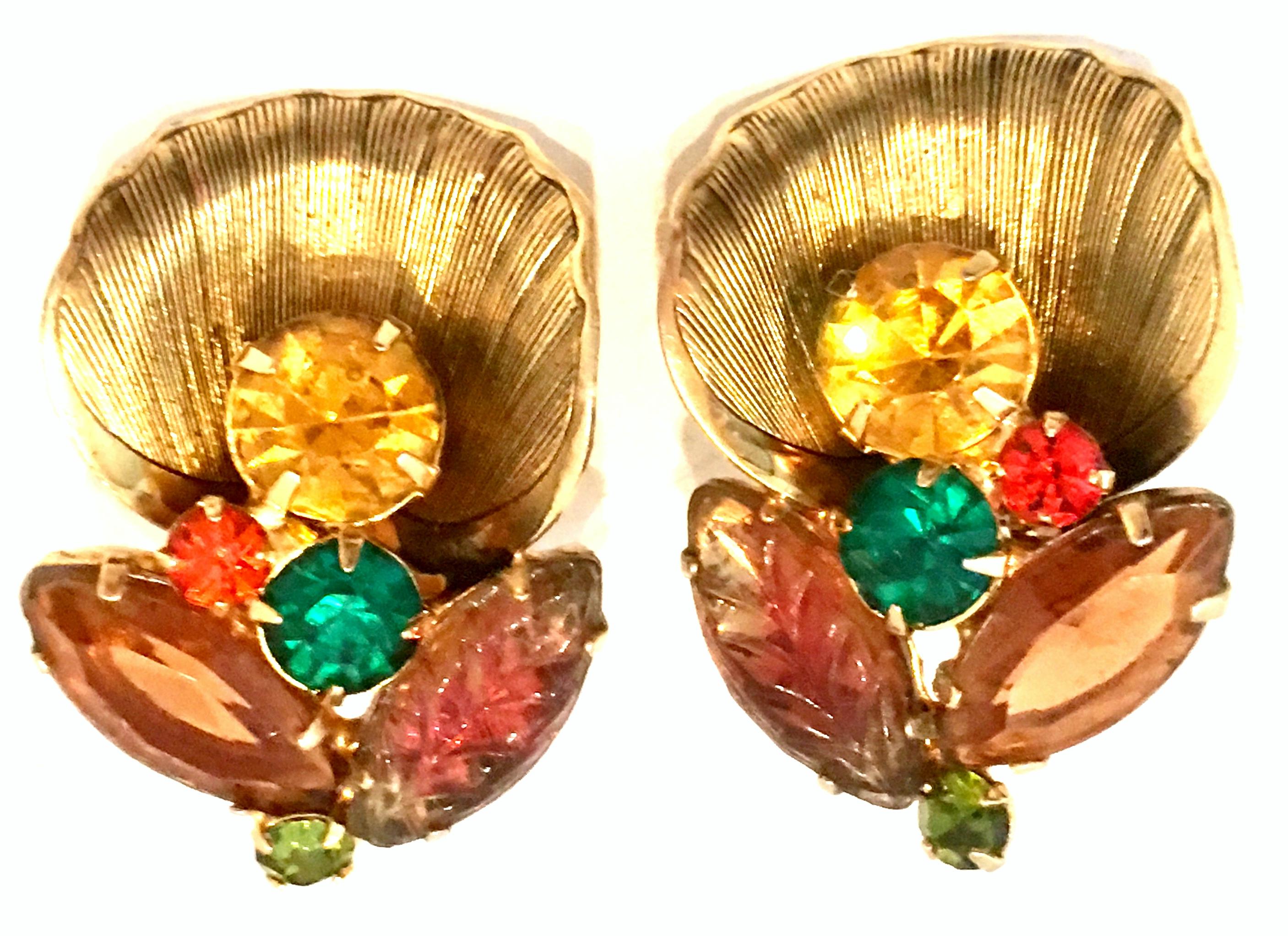 Mid-20th Pair Of Century Gold Plate & Austrian Crystal Abstract Floral Earrings. These finely crafted, unique and festive dimensional earrings feature gold plate metal with brilliant cut and faceted Austrian crystal and fruit salad fancy prong set