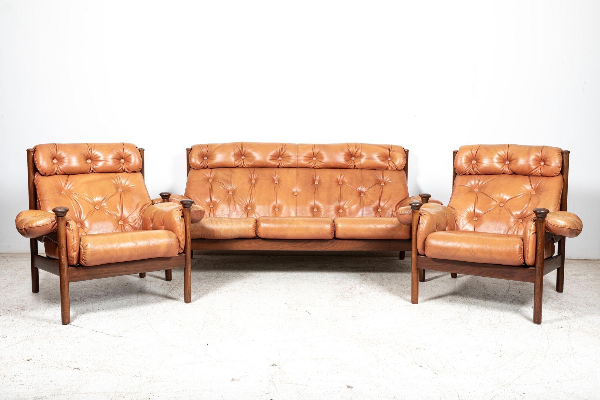 circa 1960

Mid 20thC Guy Rogers ‘Santa Fe’ Sofa Suite in Cognac Leather. Extremely comfortable button-backed leather cushions on a solid teak frame.

Designed by Eric Pamphilon and George Fejer for Guy Rogers.

sku 1016

Chairs W96 x D86 x