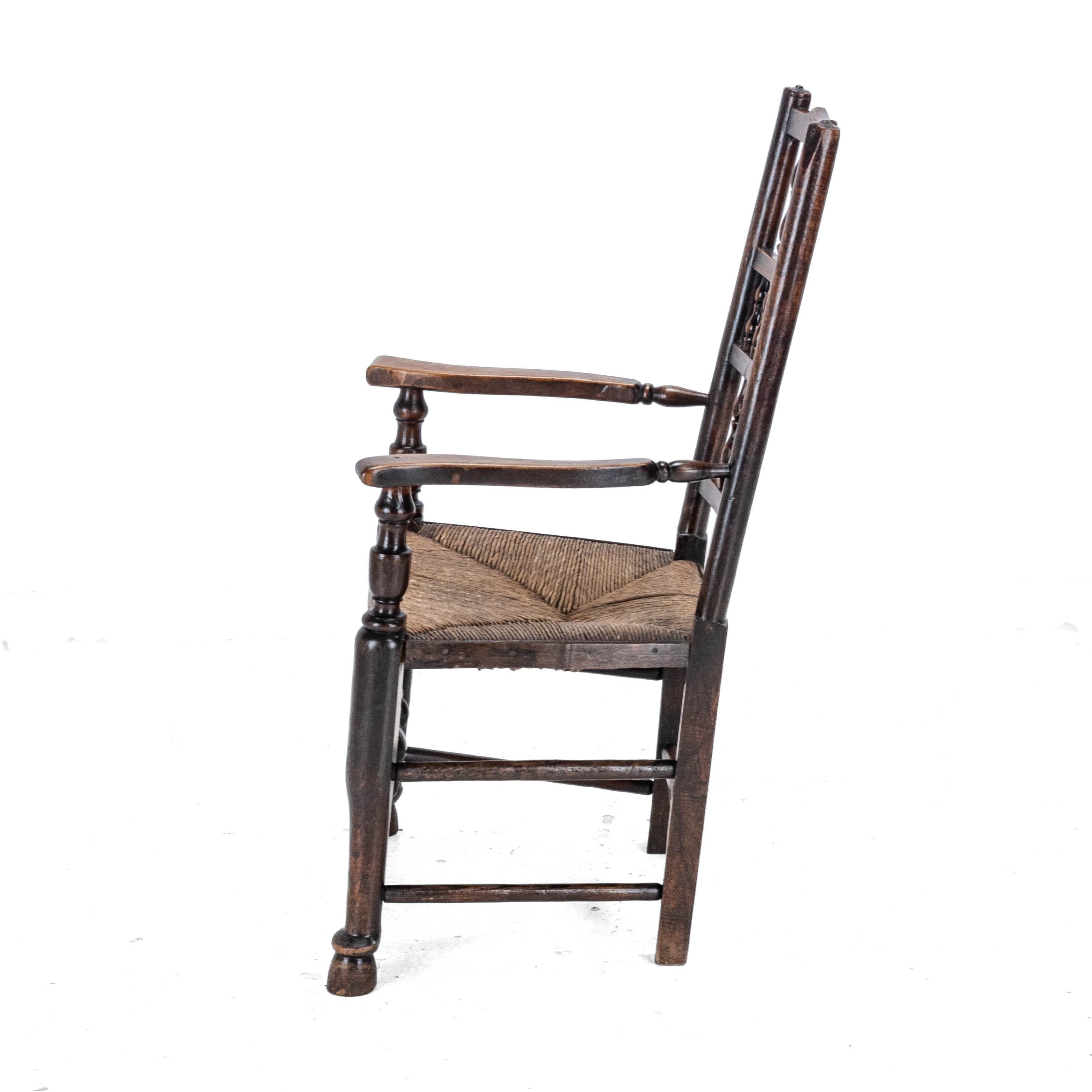 Mid c.19th Elm & Ash Lancashire Rush Seat Country Elbow Chair Carver Armchair In Good Condition For Sale In Leeds, GB