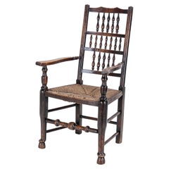 Mitte des 19. Jahrhunderts Ulme & Esche Lancashire Binsensitz Country Elbow Chair Schnitzersessel