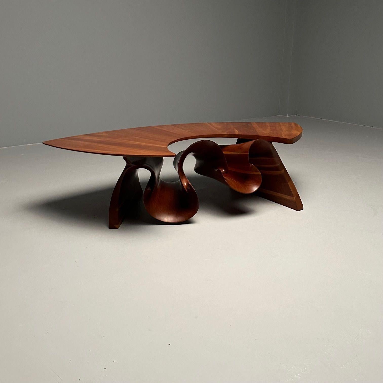 Peter Michael Adams, Mid-Century, Sculptural Coffee Table, Walnut, USA, 1970s

A rare and important coffee / cocktail table branded with the initials PMA. The wildly sculptural base supporting a pegged removable table top in a boomerang form. This