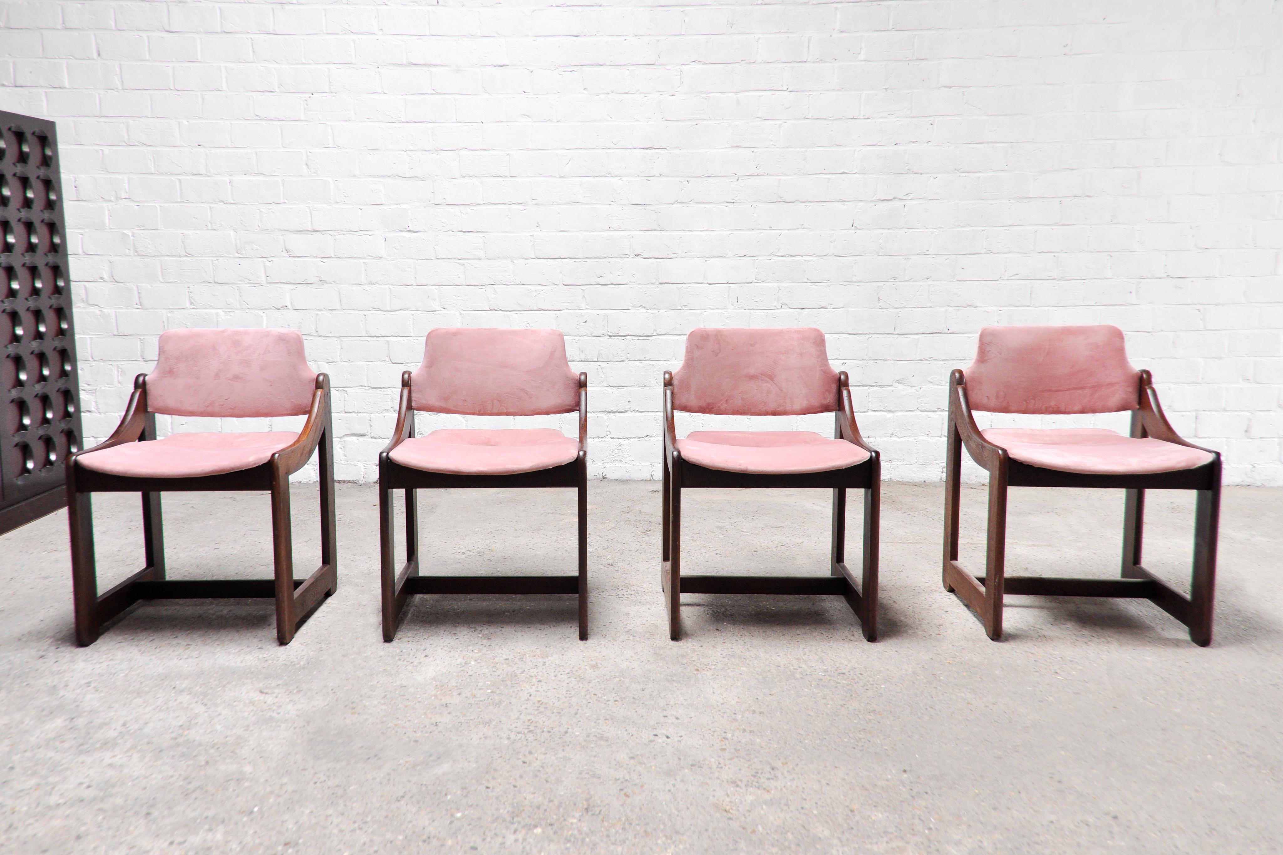 Beautiful set of four solid wengé wood italian dining chairs, 1960's. The elegant shaped wooden frame is warm in colour and conveys the spirit of 60's Modernism and  Mid-century design. The comfortable seats have been newly upholstered in a soft