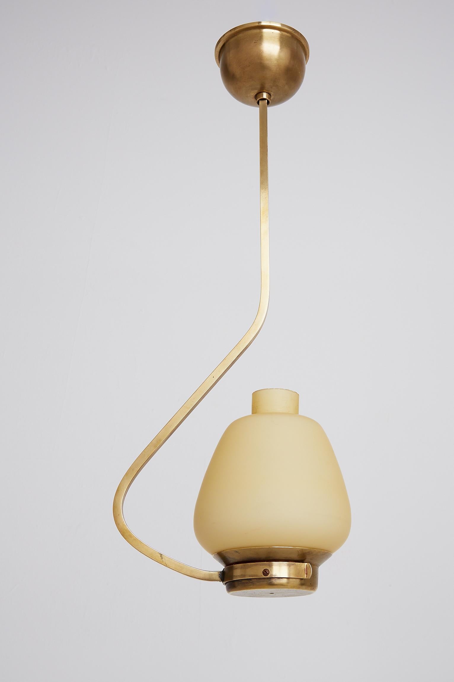 A brass and glass ceiling light,
Sweden, late 1940s.