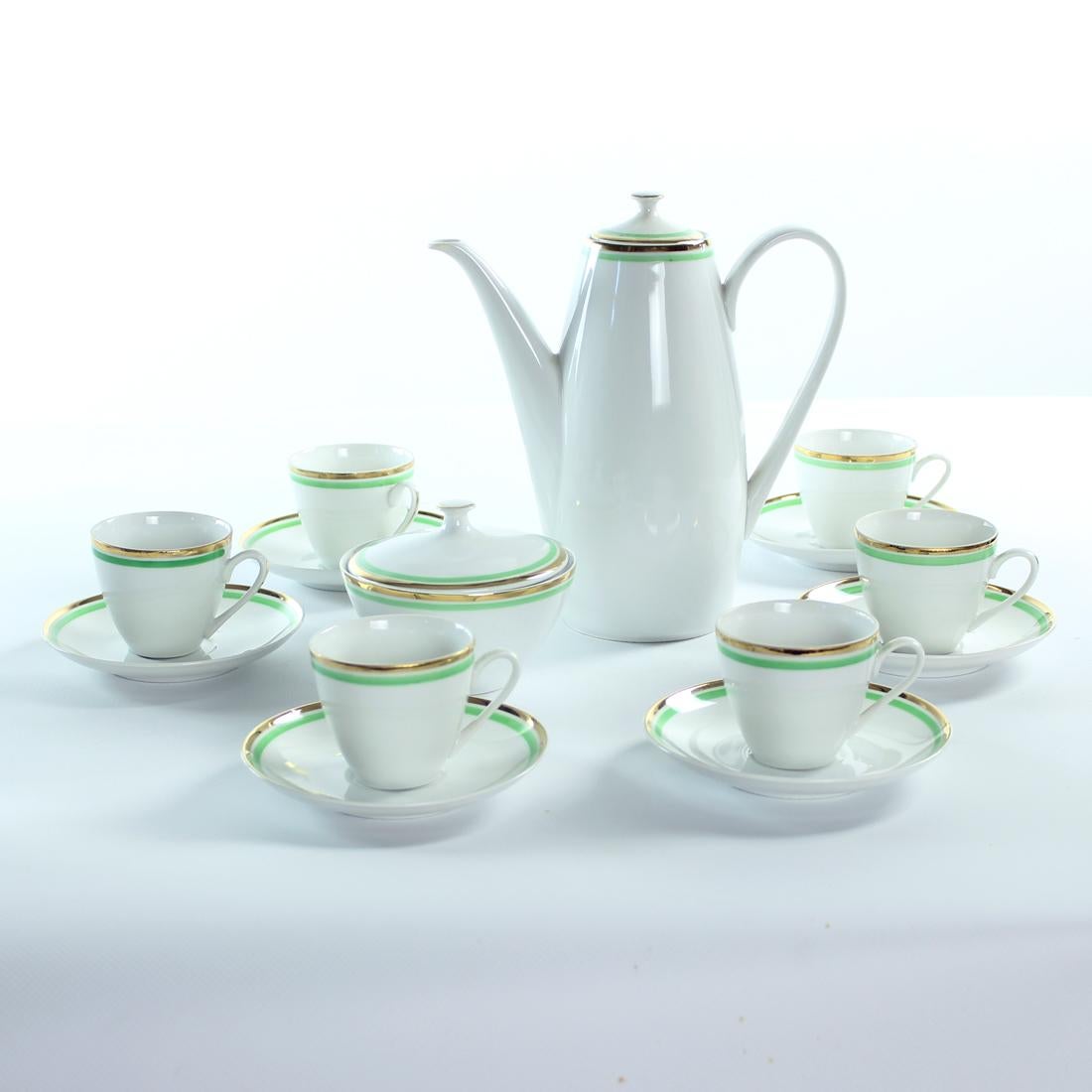Beautiful mid-century porcelain set for tea or coffee serving. Original porcelain made in Czechoslovakia in 1954. The set is stamped with original stamp on each piece by Bohemia porcelain manufacturer Nova Role. Original design. White porcelain with