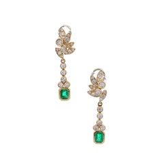 Mid-centurt 18kt yellow Gold Earrings with Colombian Emeralds
Diamonds