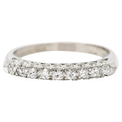 Mid-Century 0.25 Carat Diamond Platinum Fishtail Band Ring