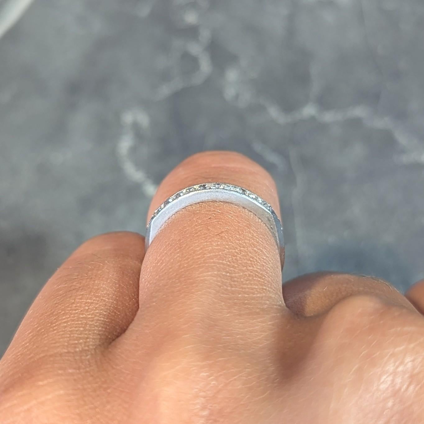 Mid-Century 0.30 CTW Diamond Platinum Vintage Knife Edge Channel Band Ring 7