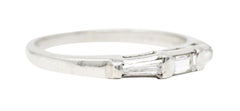 Mid-Century 0.31 Carat Baguette Diamond Platinum Three Stone Wedding Band Ring