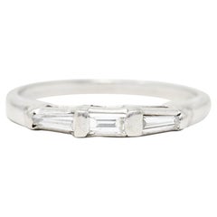 Mid-Century 0.31 Carat Baguette Diamond Platinum Three Stone Wedding Band Ring