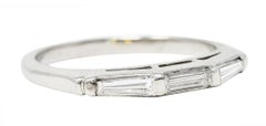 Mid-Century 0.32 Carat Diamond Platinum Three Stone Wedding Band Ring