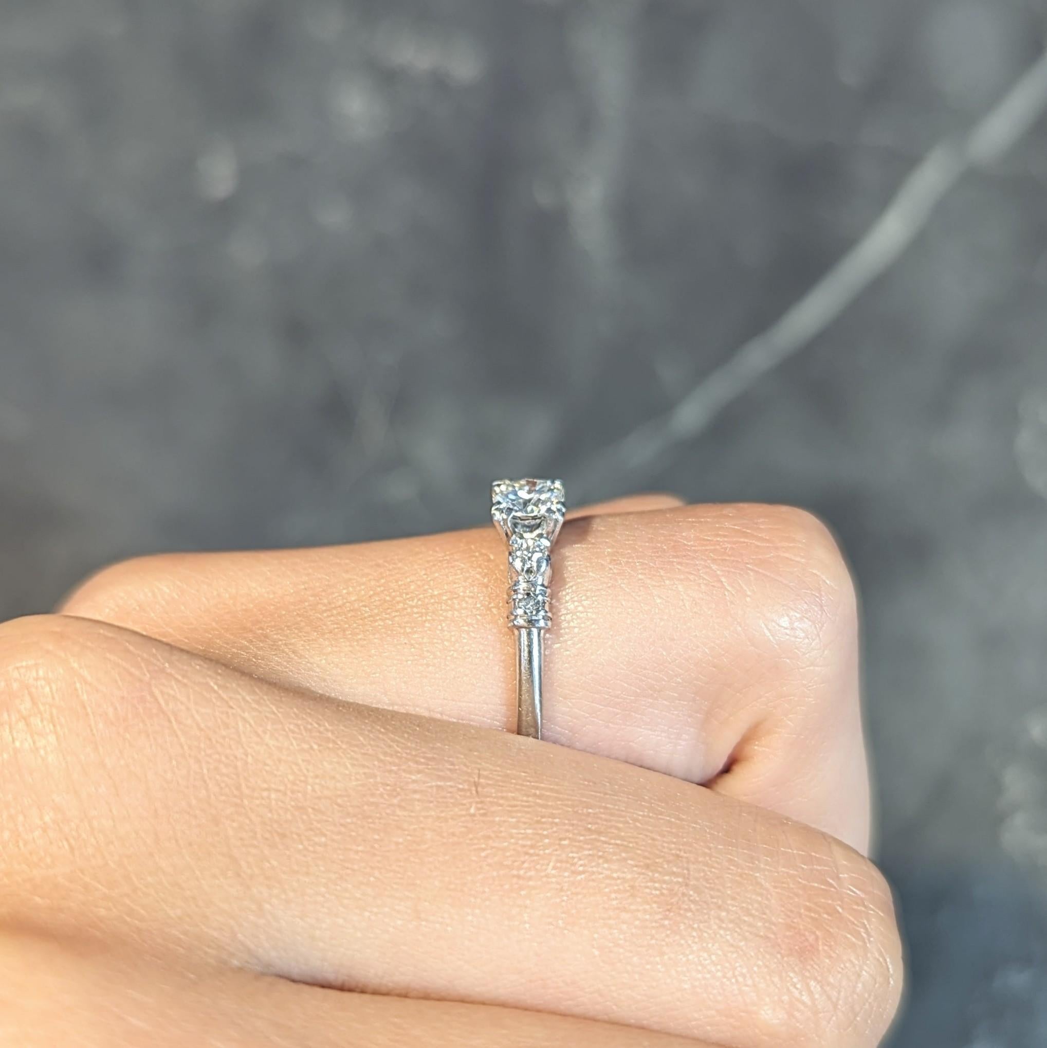 Mid-Century 0.55 CTW Diamond Platinum Five Stone Vintage Engagement Ring For Sale 7